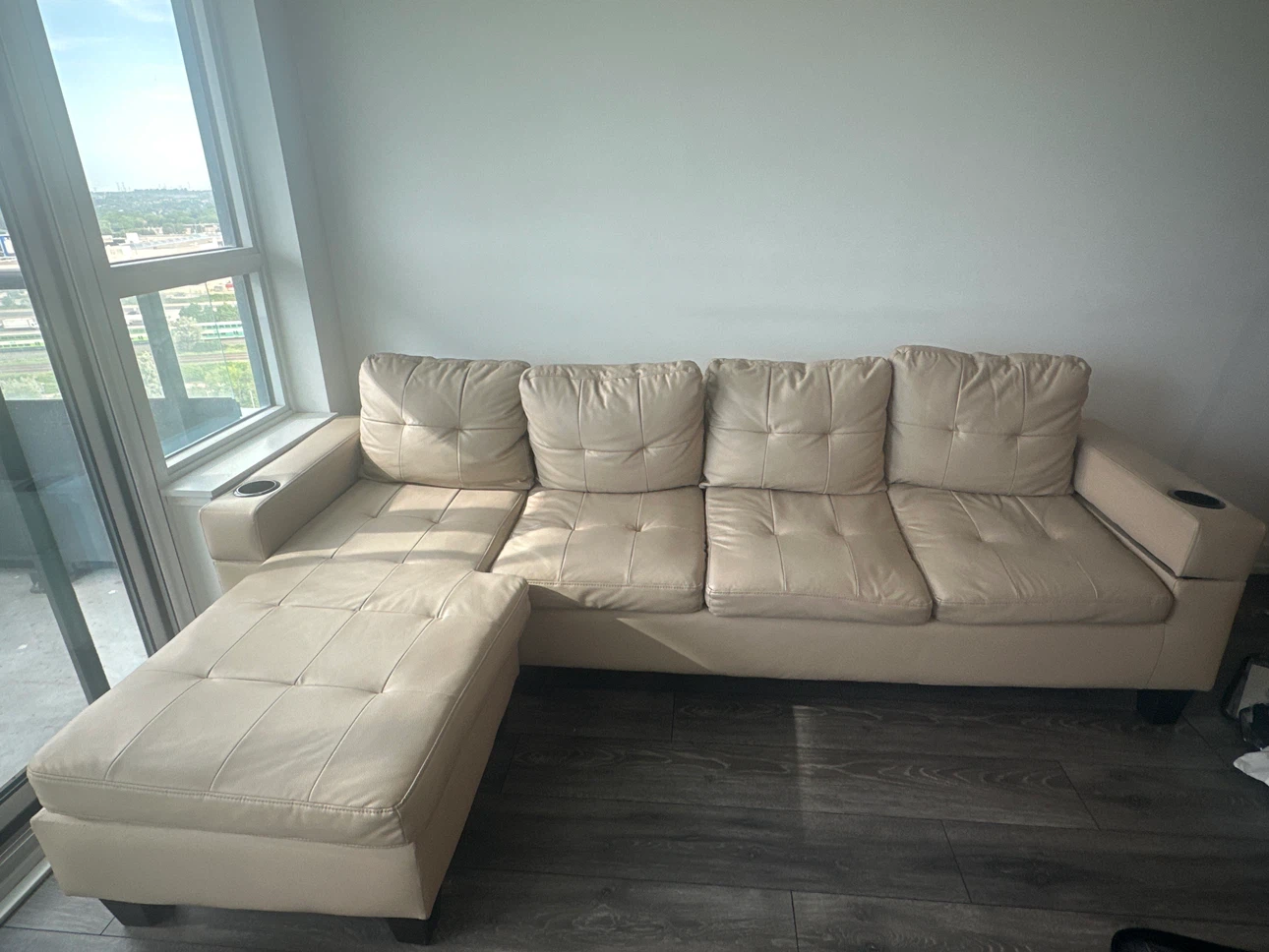 Beige Sectional Sofa with Chaise and Cup Holders