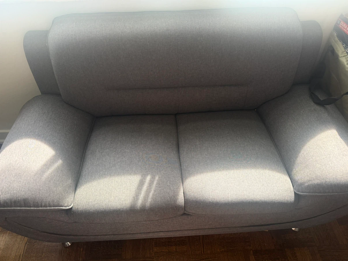 Grey fabric loveseat