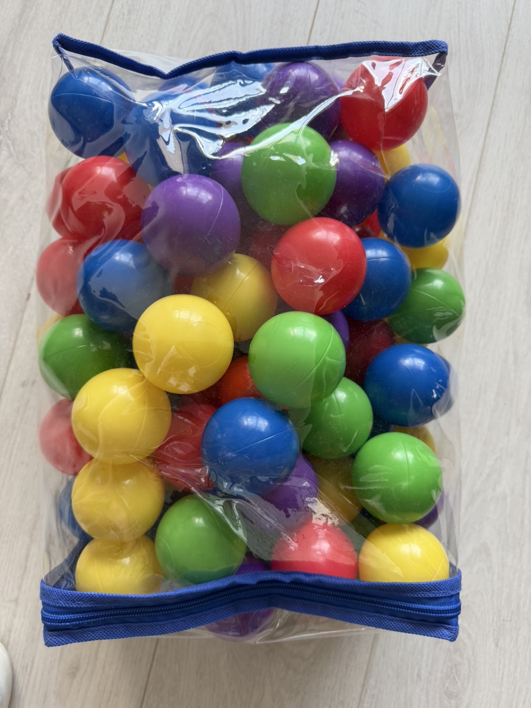 Bag of colourful plastic balls