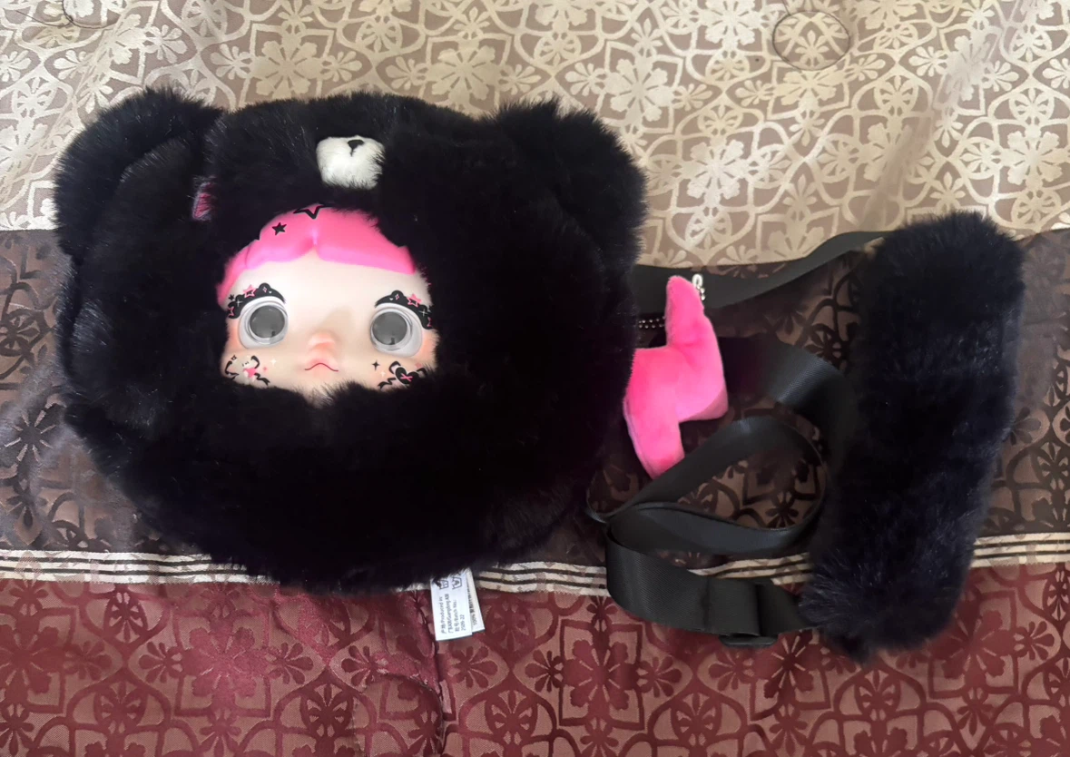Nommi collecting cutie bag