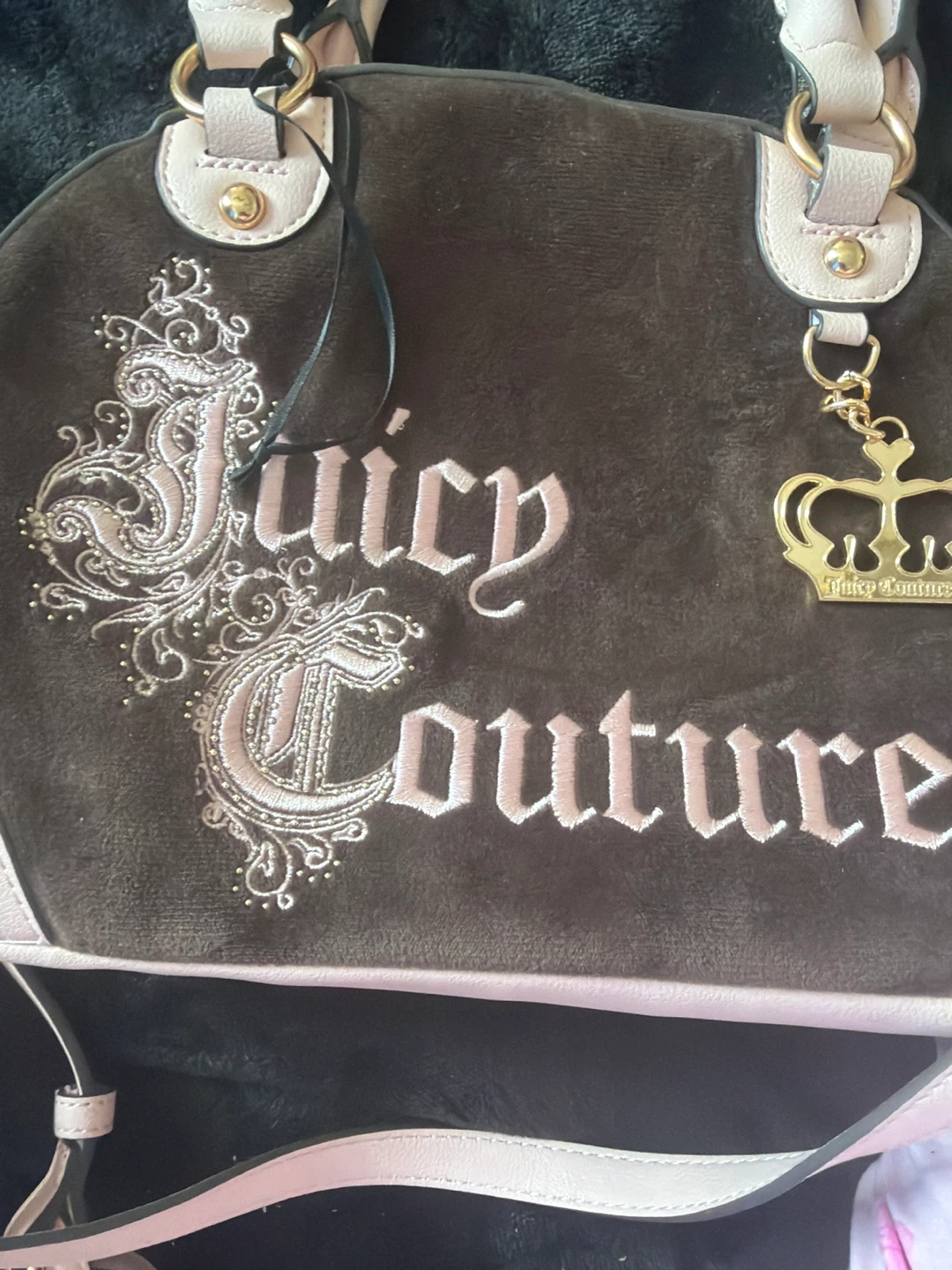 Juicy couture and in Victoria’s Secret bag