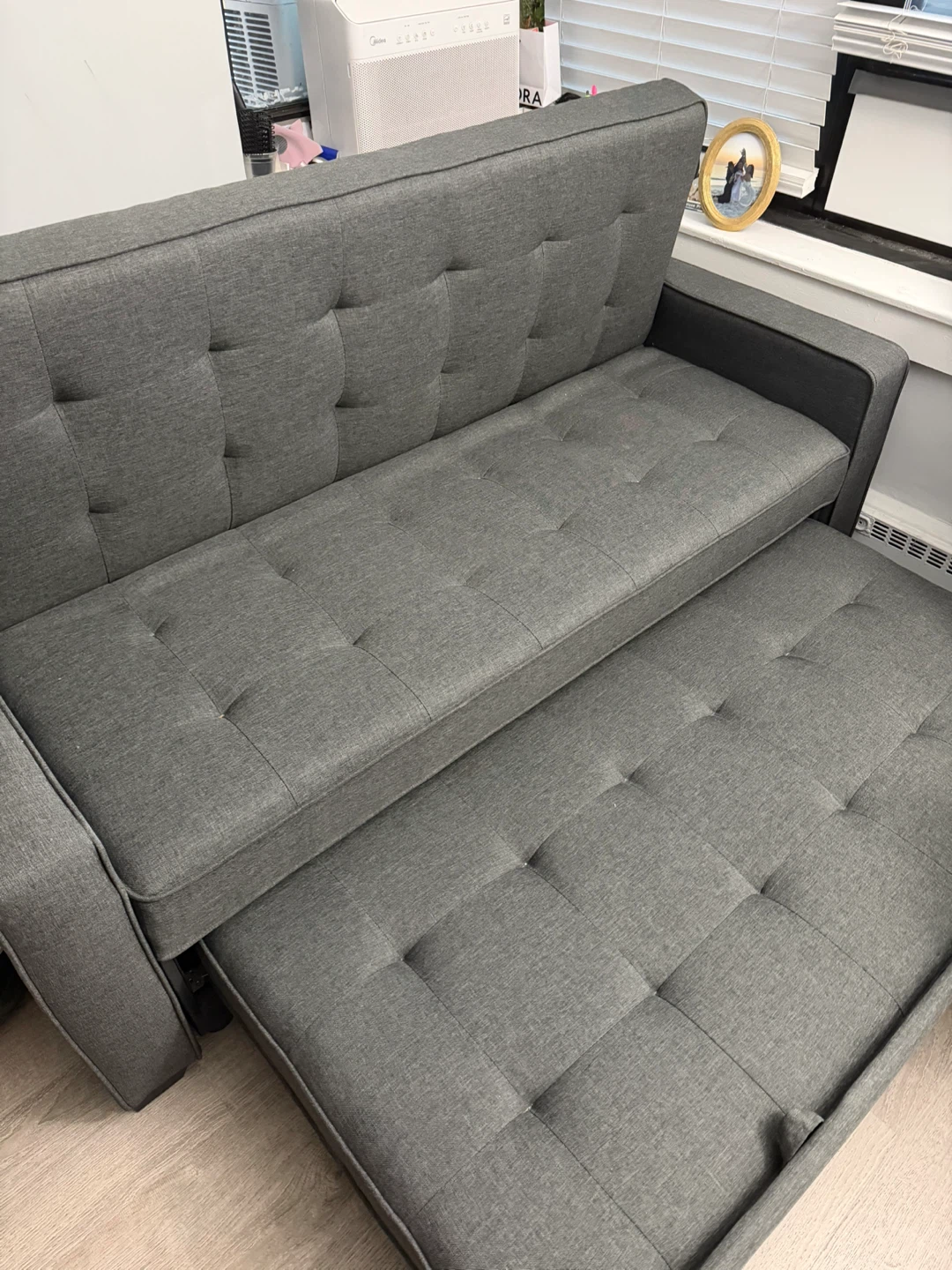 Gray Tufted Sofa Bed with Pull-Out Ottoman