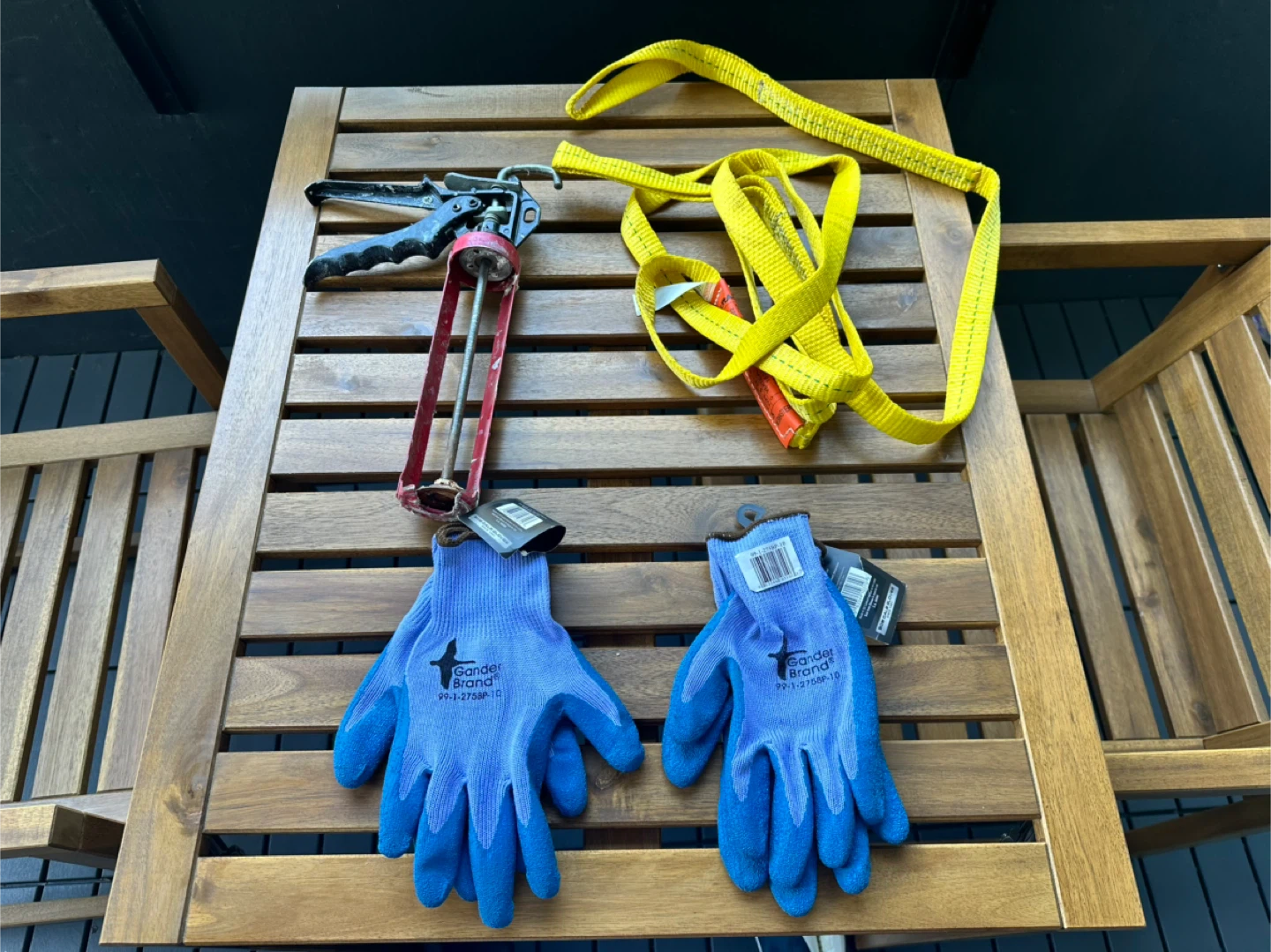 Caulking Gun, Lifting Sling, and Gander Brand Work Gloves