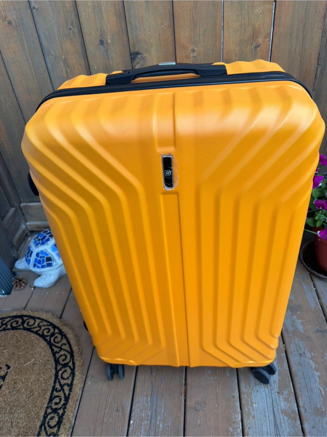 American Tourister Orange Hardside Spinner Luggage