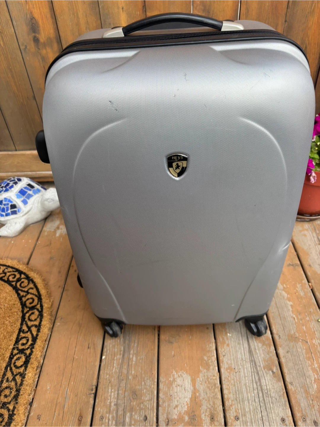 Silver HEYS Spinner Luggage