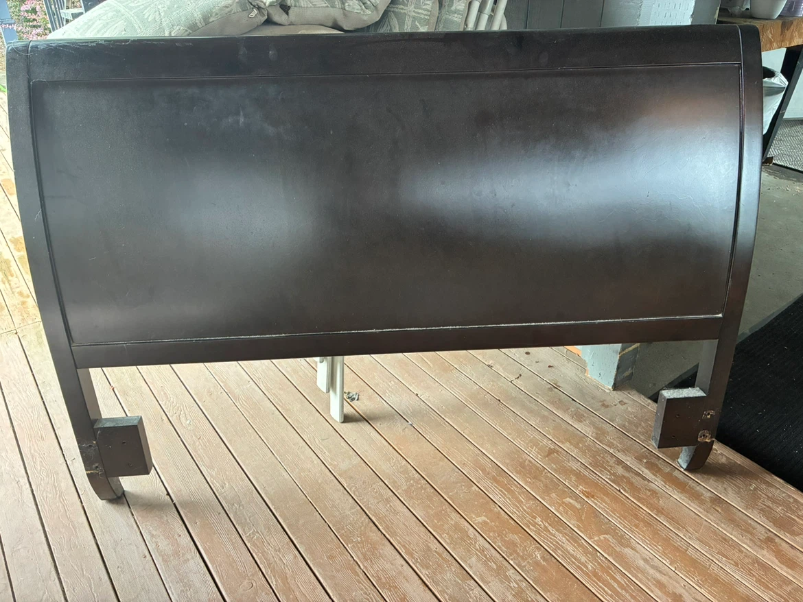 Queen sized dark brown headboard