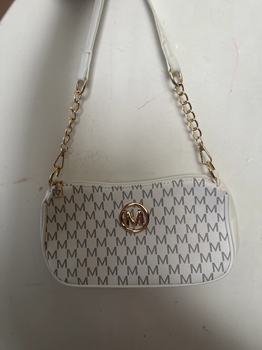 White shoulder bag with monogram print