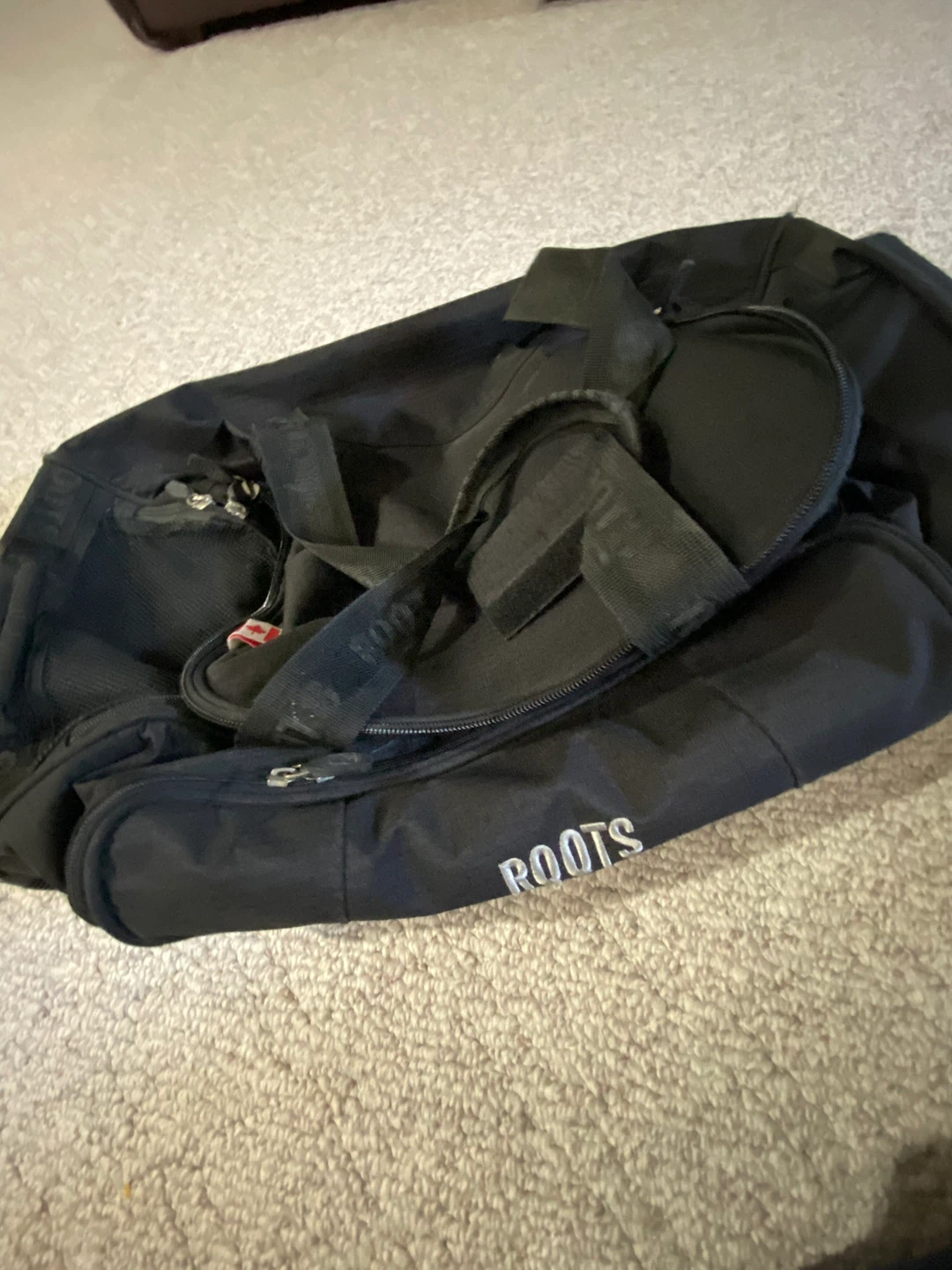 Black ROOTS Duffle Bag with Wheels