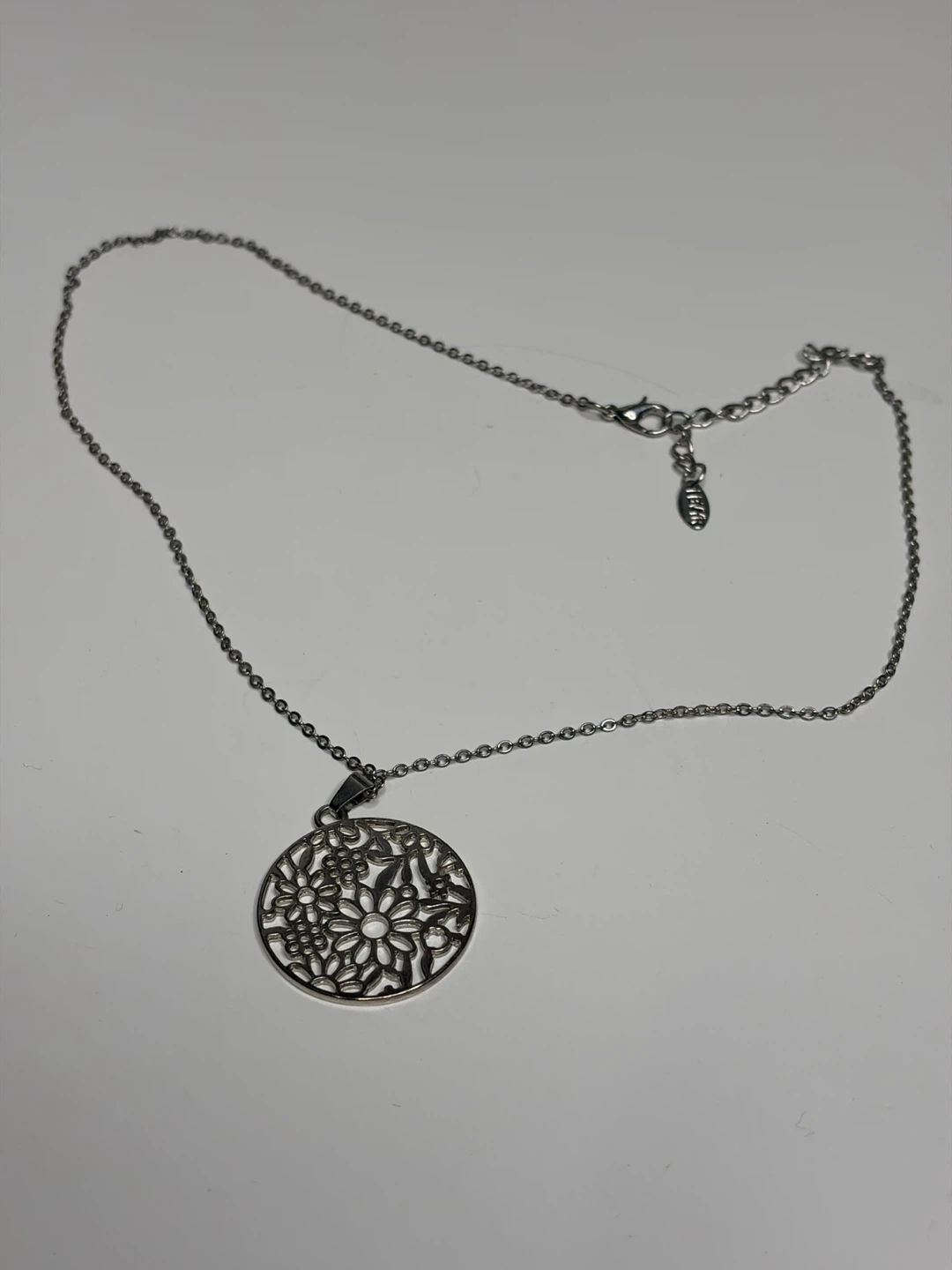 Silver-tone Pendant Necklace with Floral Design