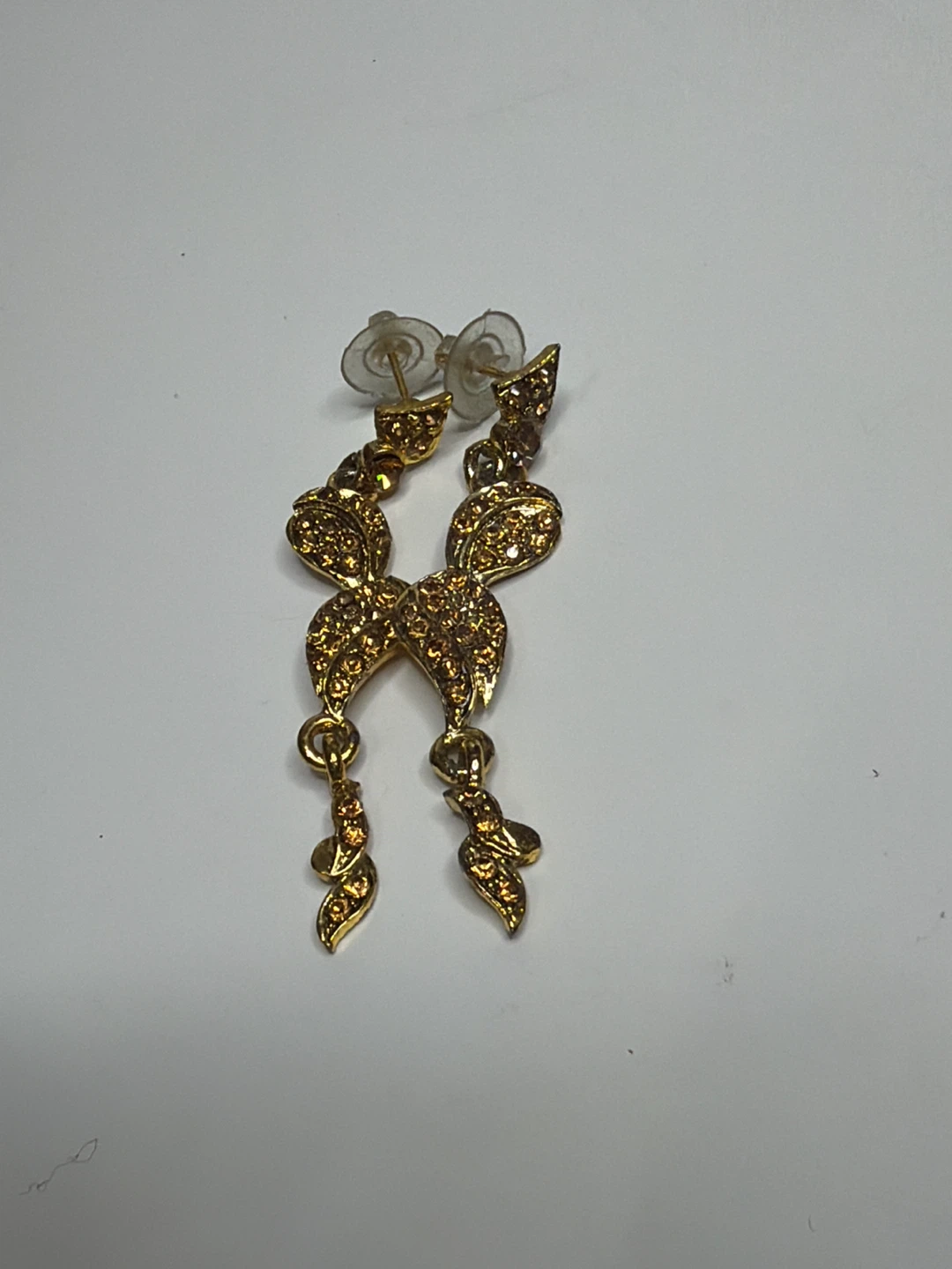 Gold Tone Bow Dangle Earrings with Rhinestones