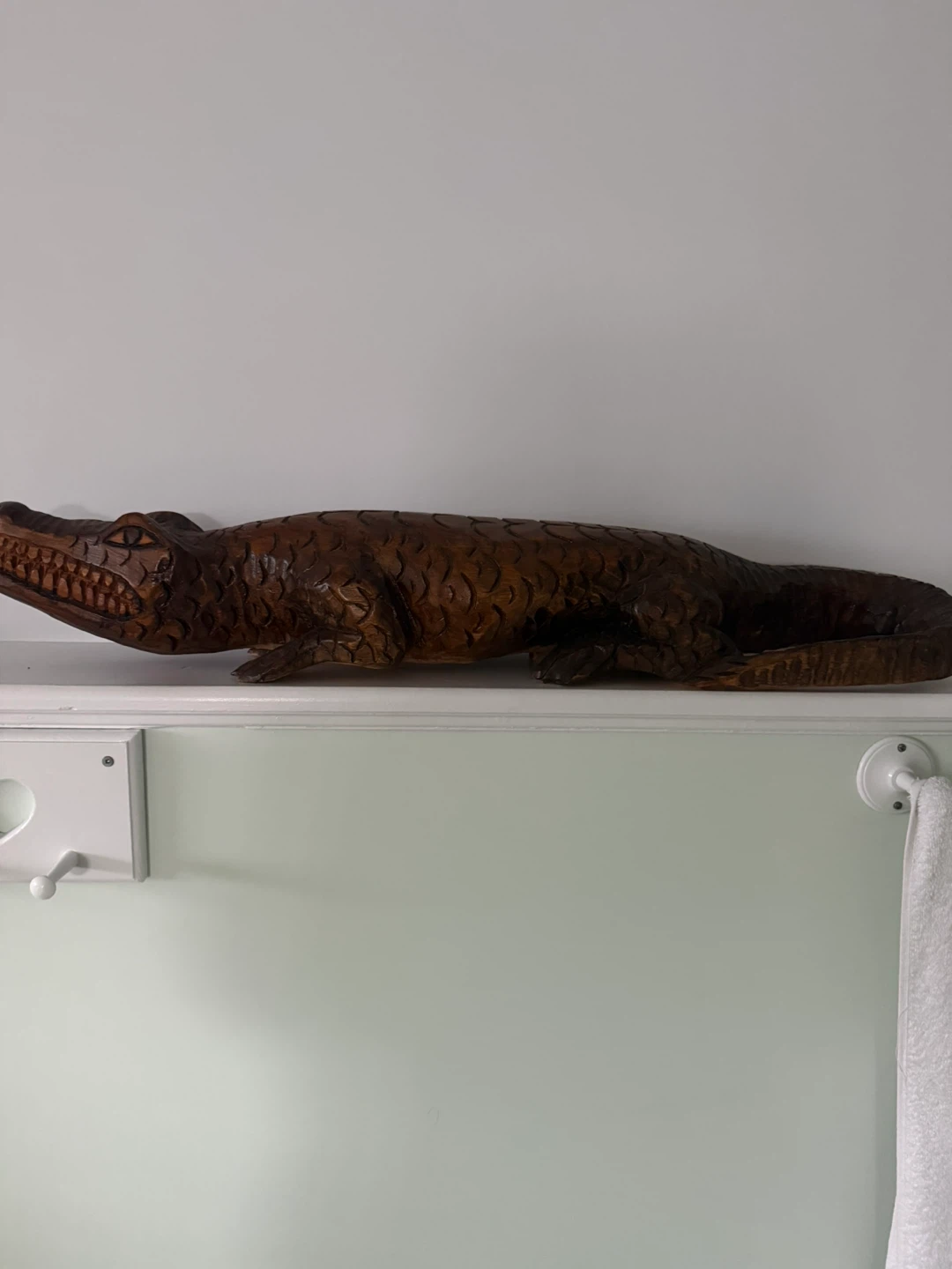Hand-carved wooden alligator decor