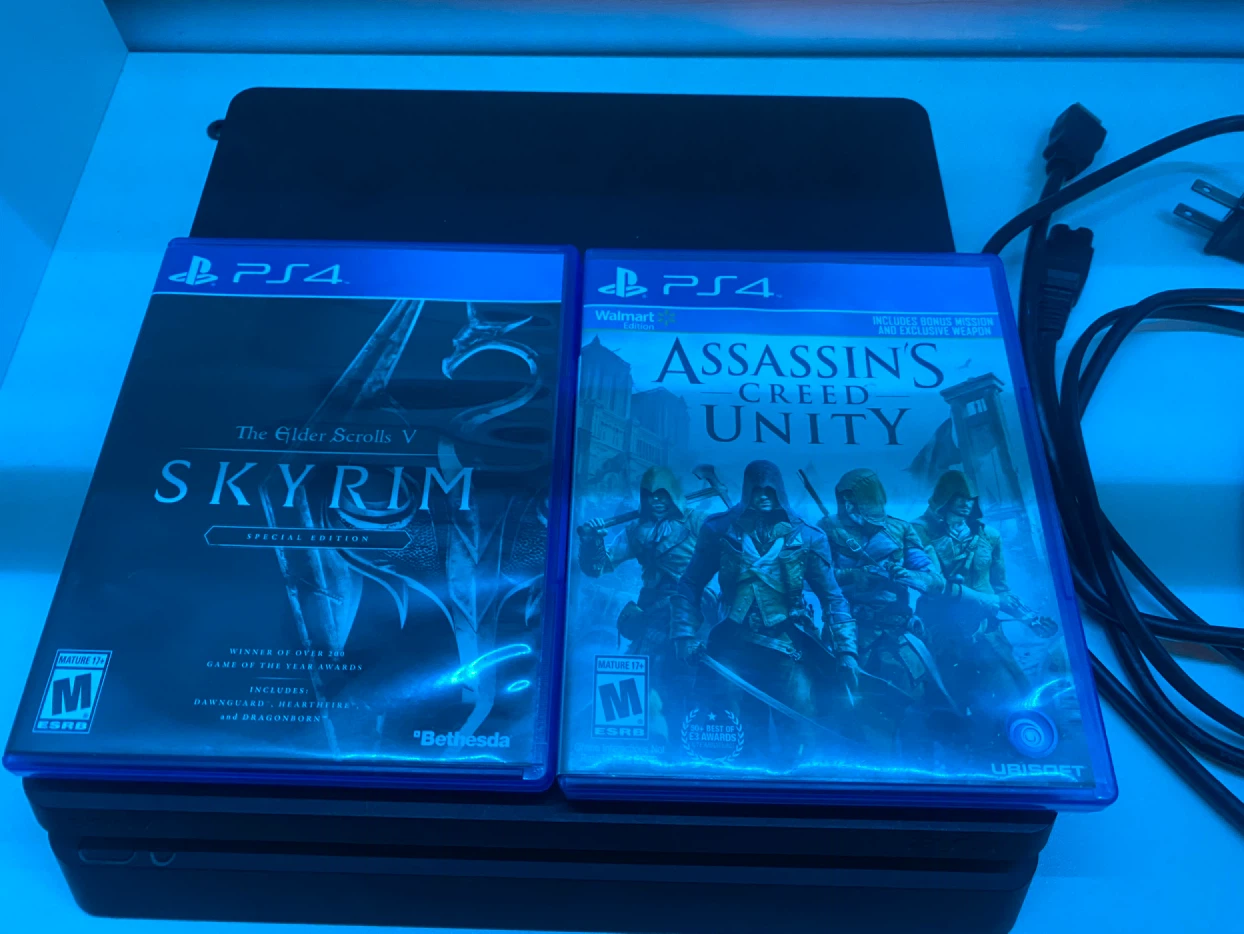 Sony PlayStation 4 Pro Console with Games and Controllers - photo 2
