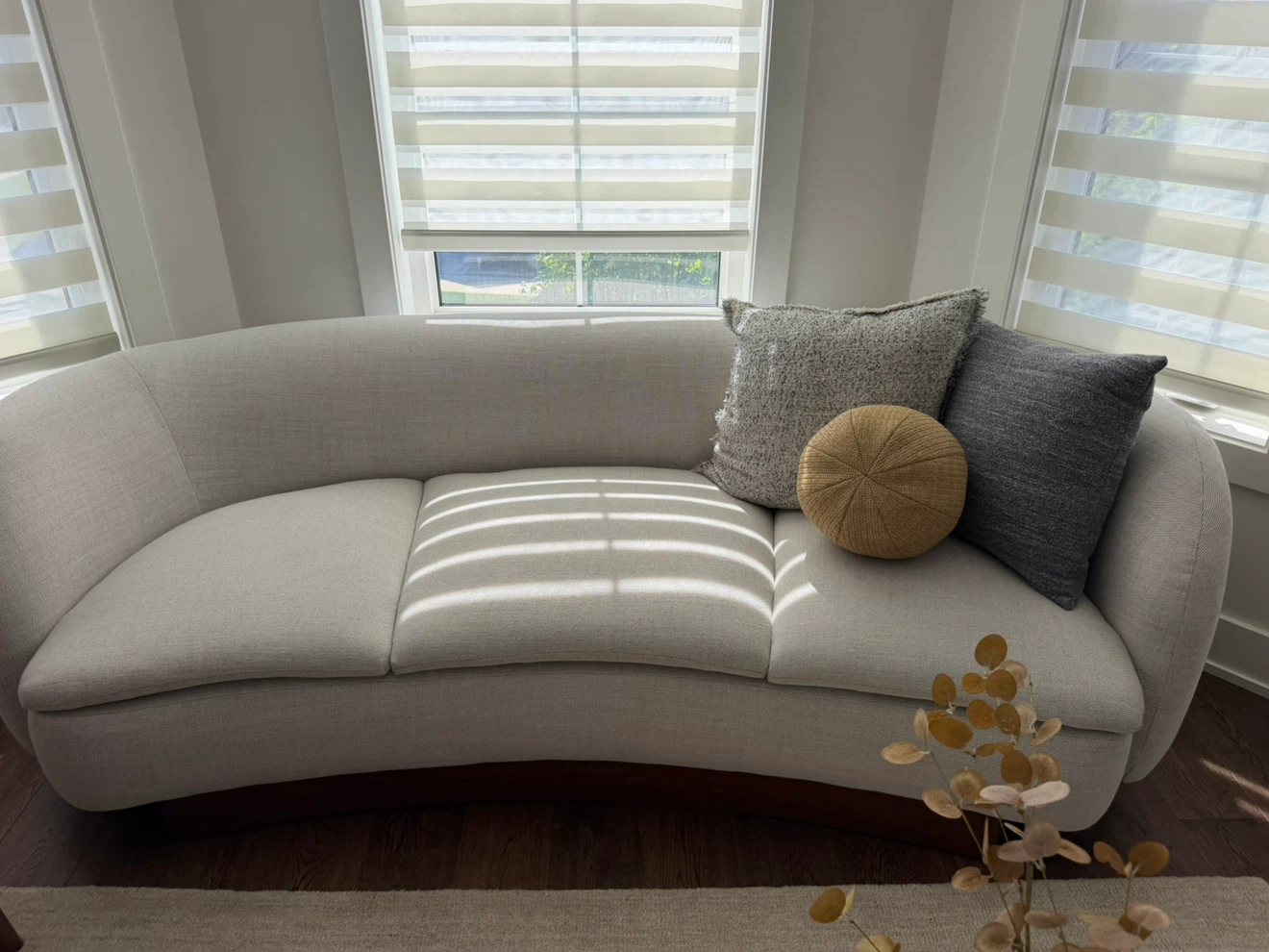 CB2 Curved Sofa with Neutral Fabric