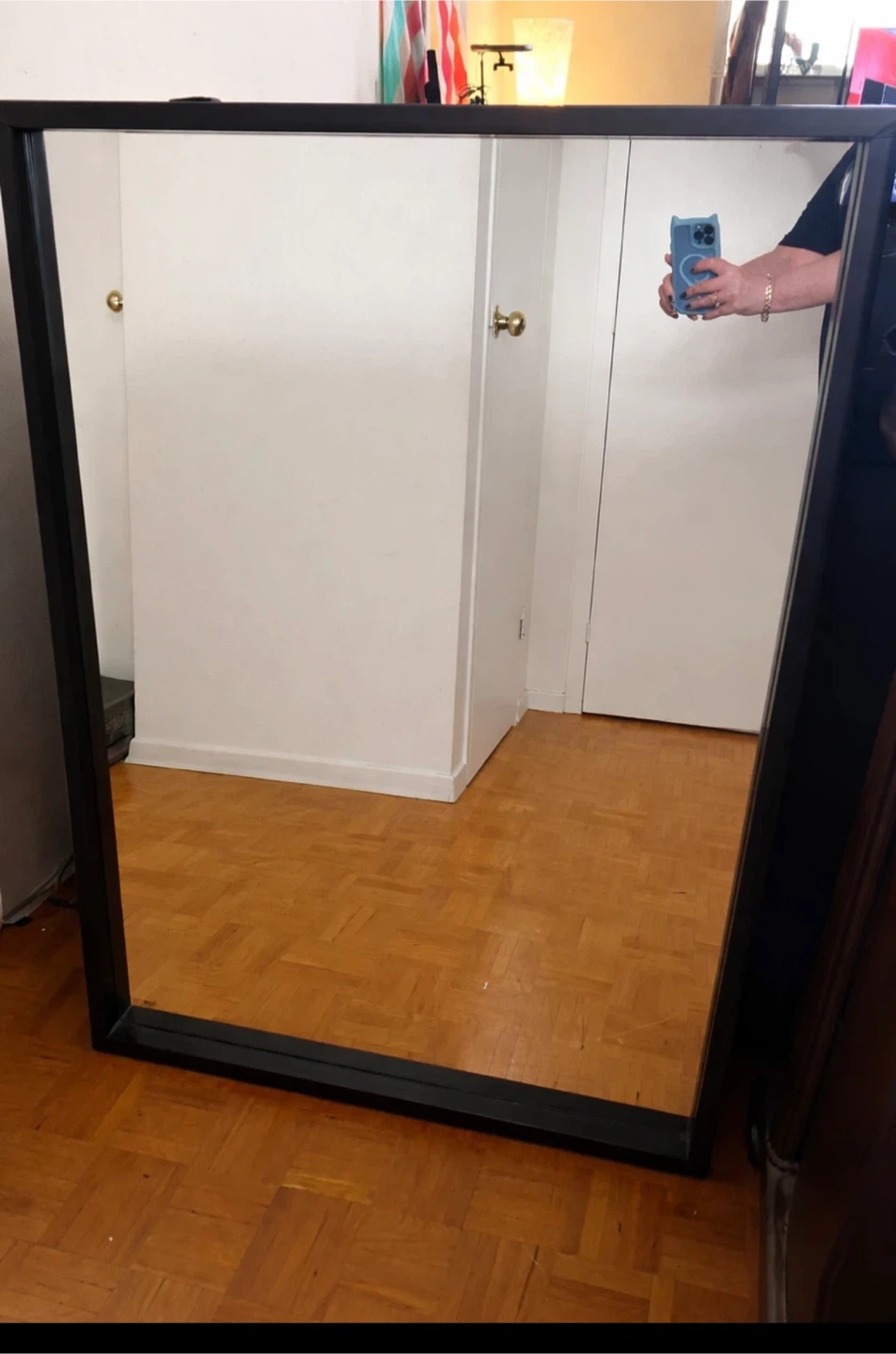 Large black framed mirror