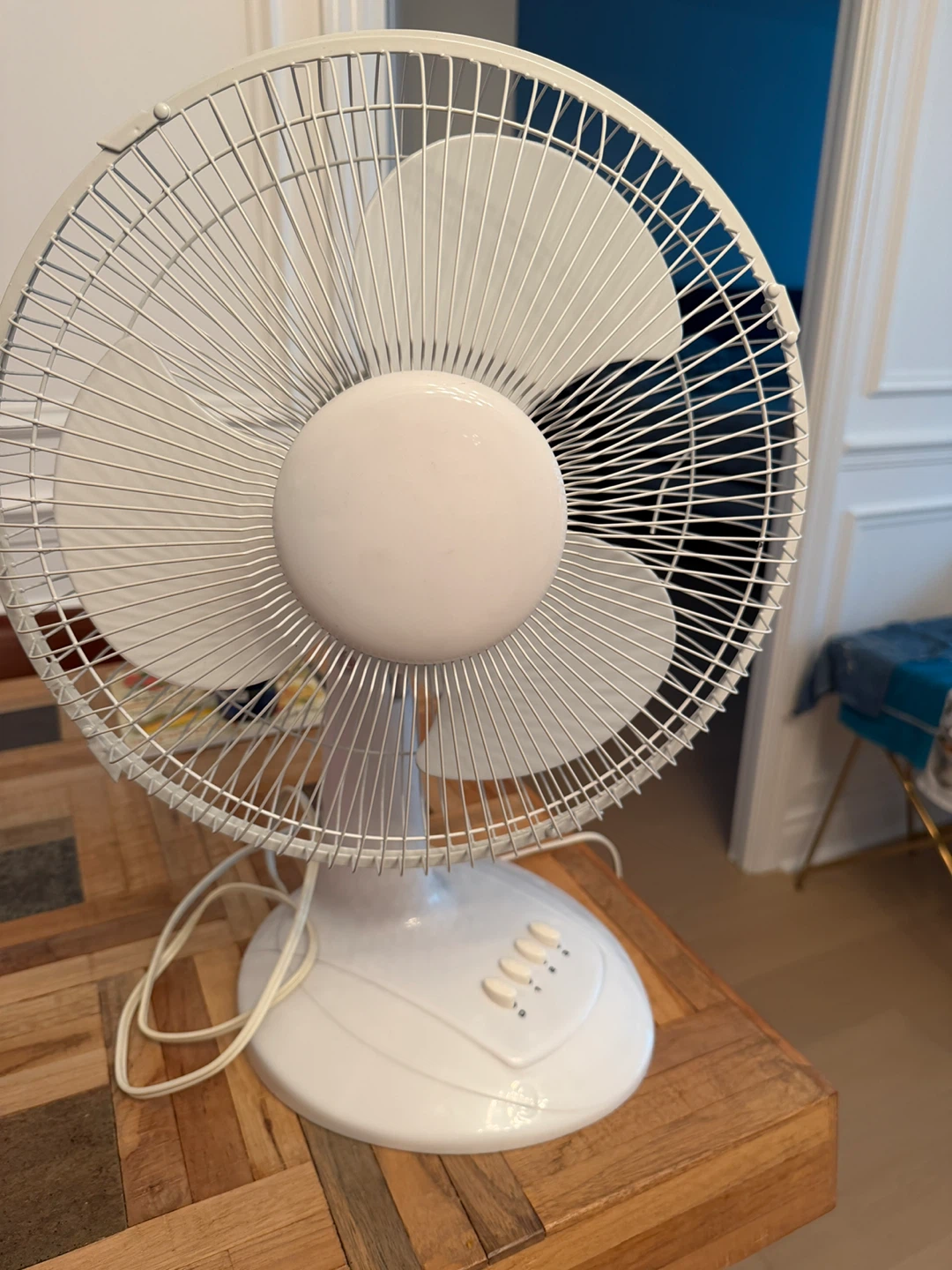 White oscillating desk fan