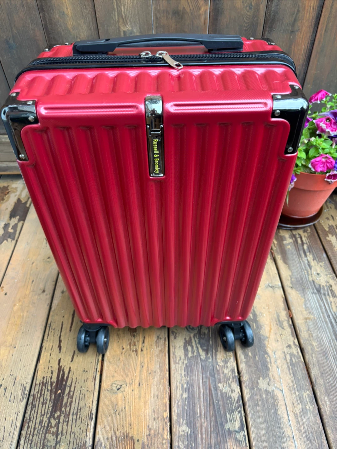 Red Russell & Bromley Carry-On Spinner Luggage