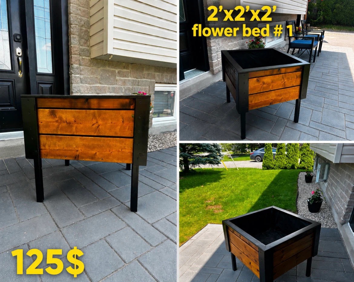 Pressure treated flower bed with black trim