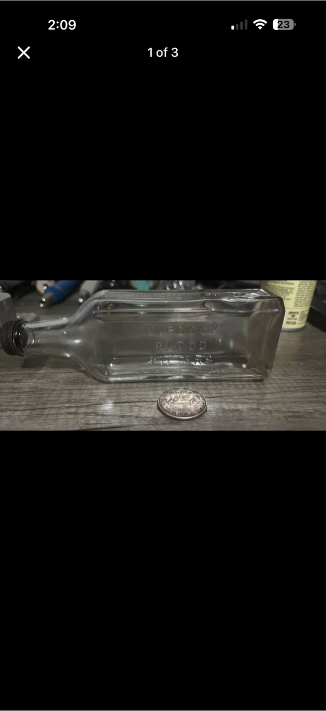 Burdock blood bitters glass bottle