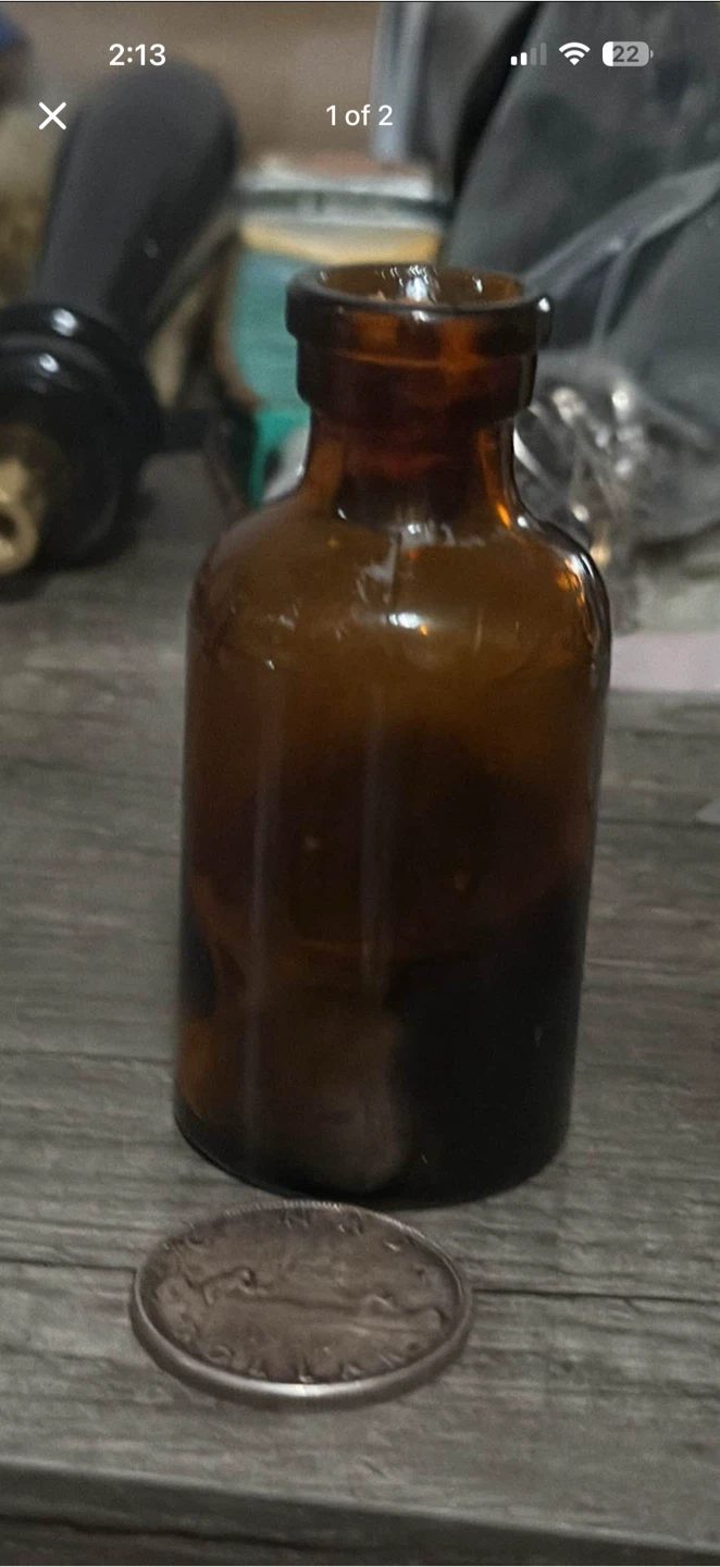 Lysol glass bottle with cork
