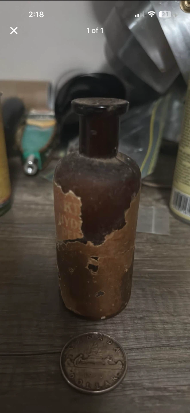 Old hydrogen peroxide glass bottle