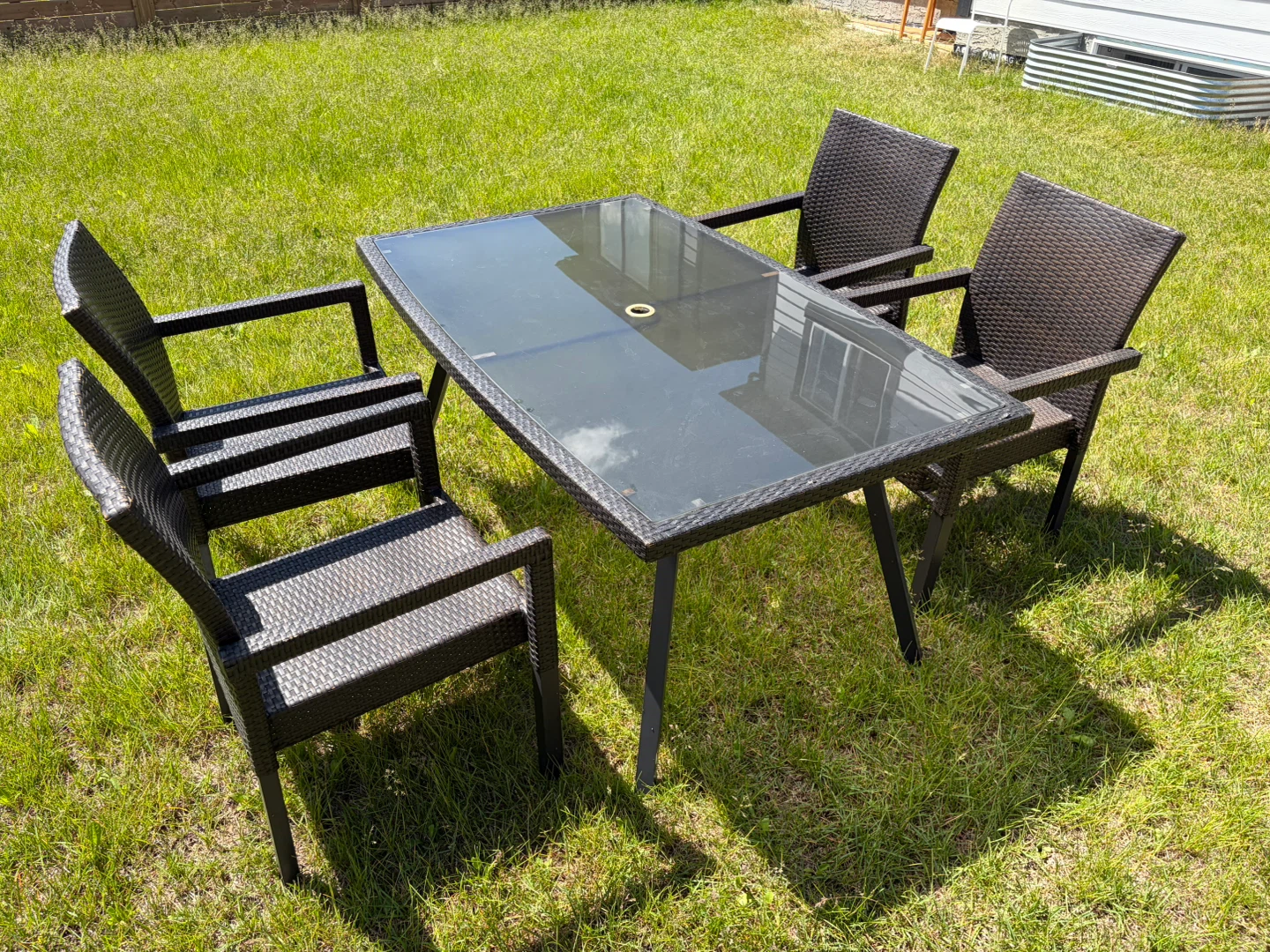 Patio set glass top table with 4 charis