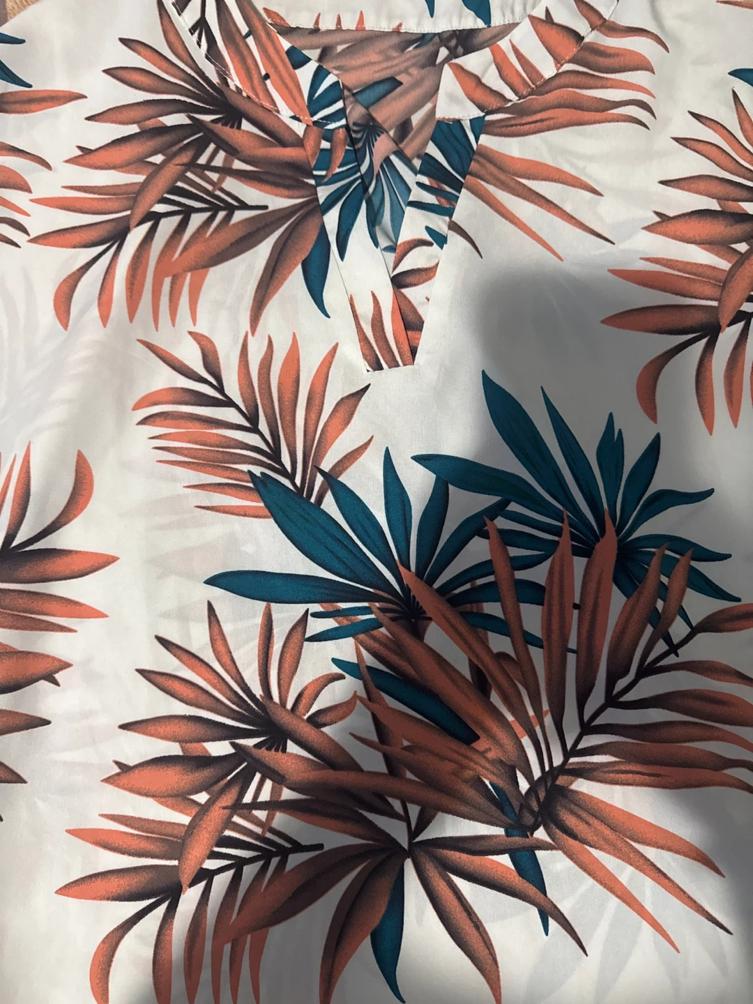 White top with tropical leaf print