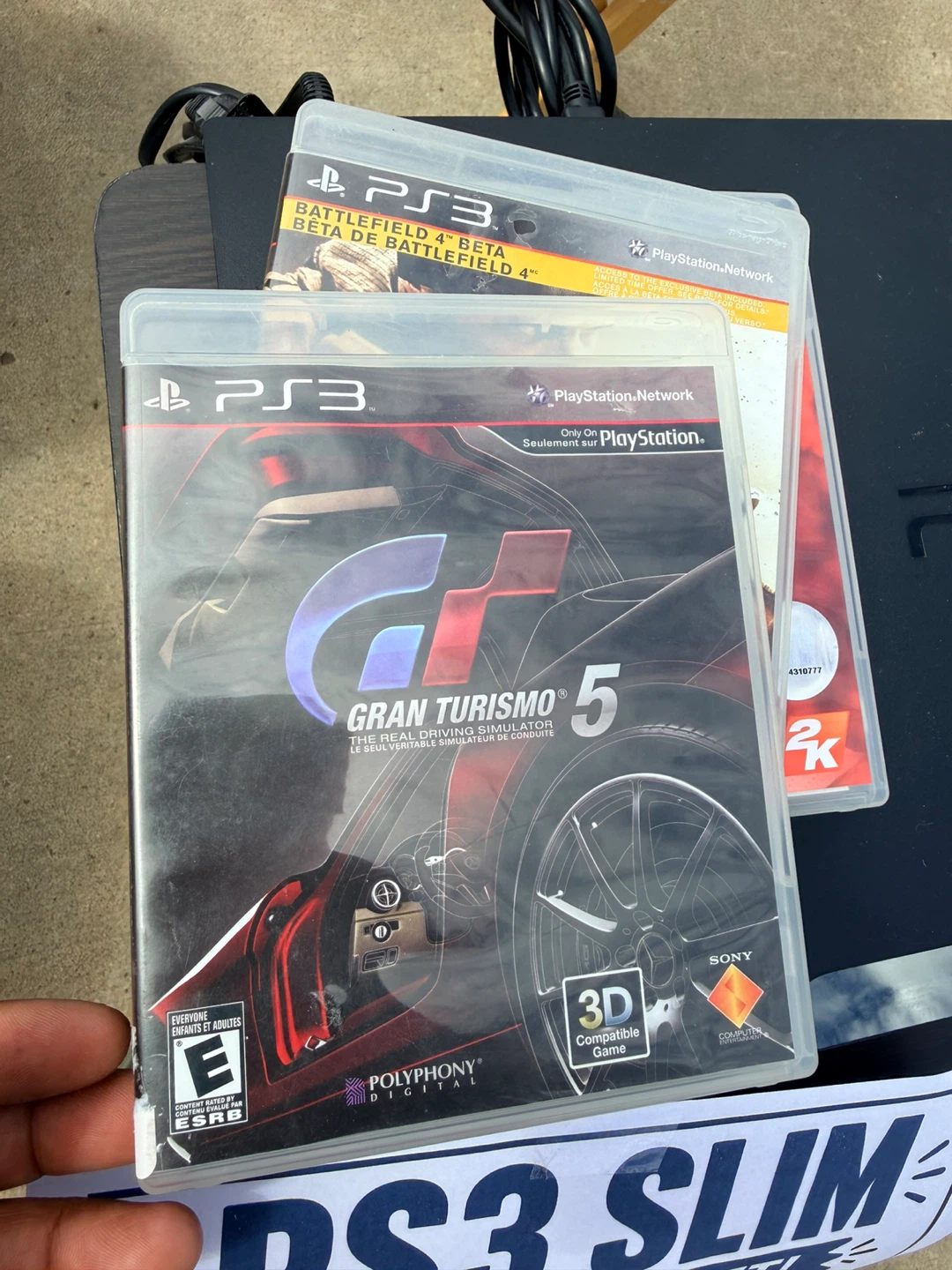 PlayStation 3 Slim Bundle with 3 Games - photo 3