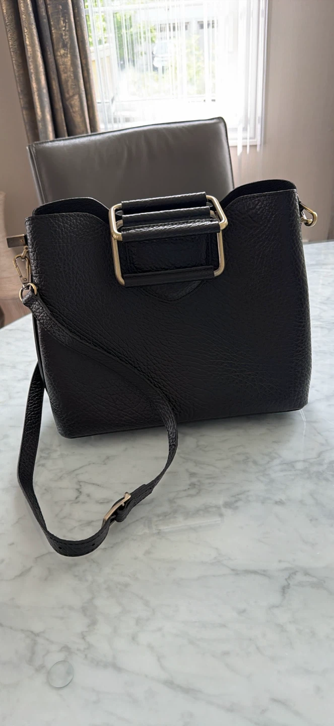 Black pebbled leather bucket bag with gold hardware