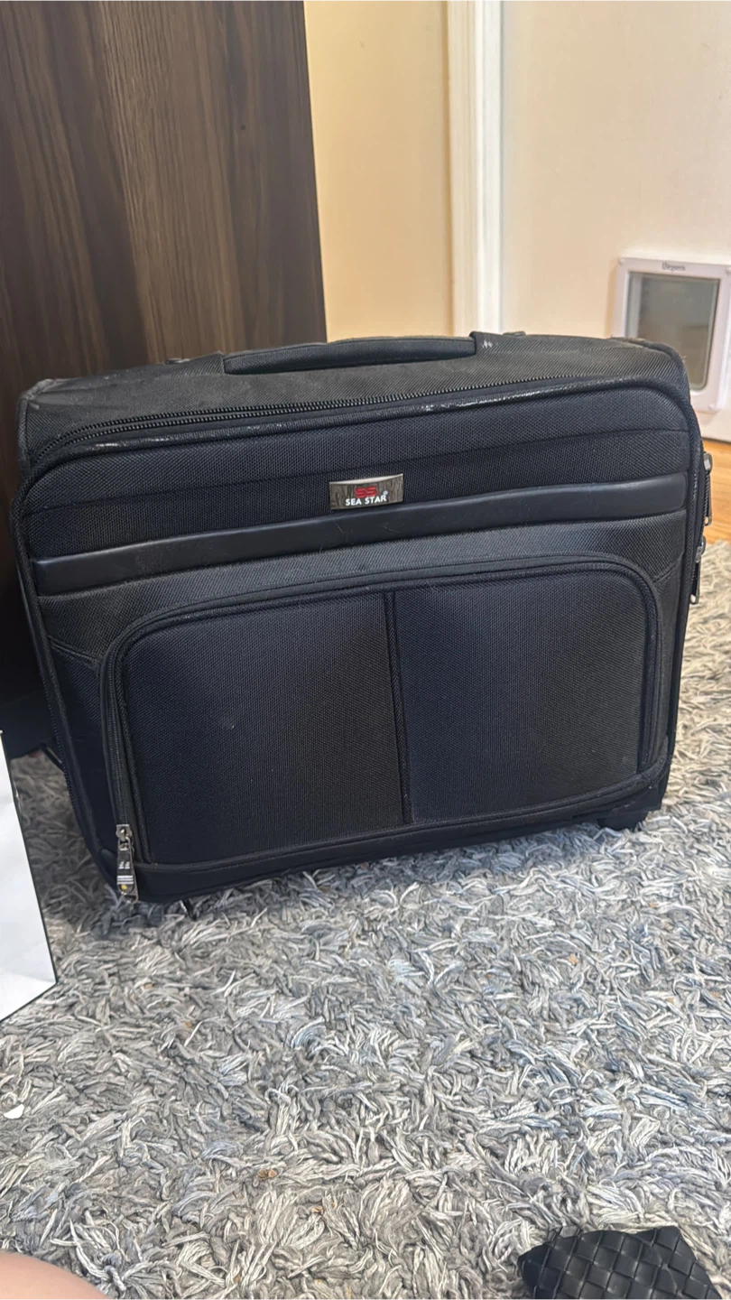 Black SEA STAR Rolling Suitcase