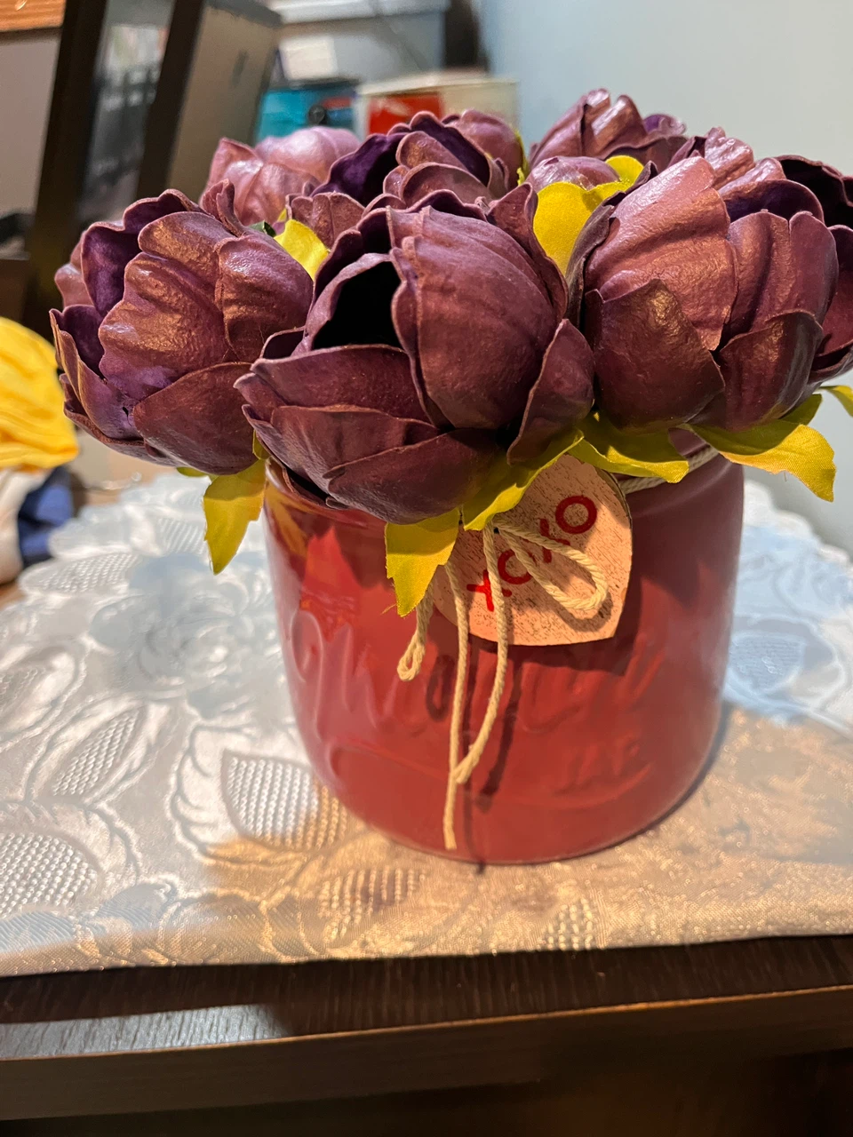 Purple Faux Flower Arrangement in Red Vase