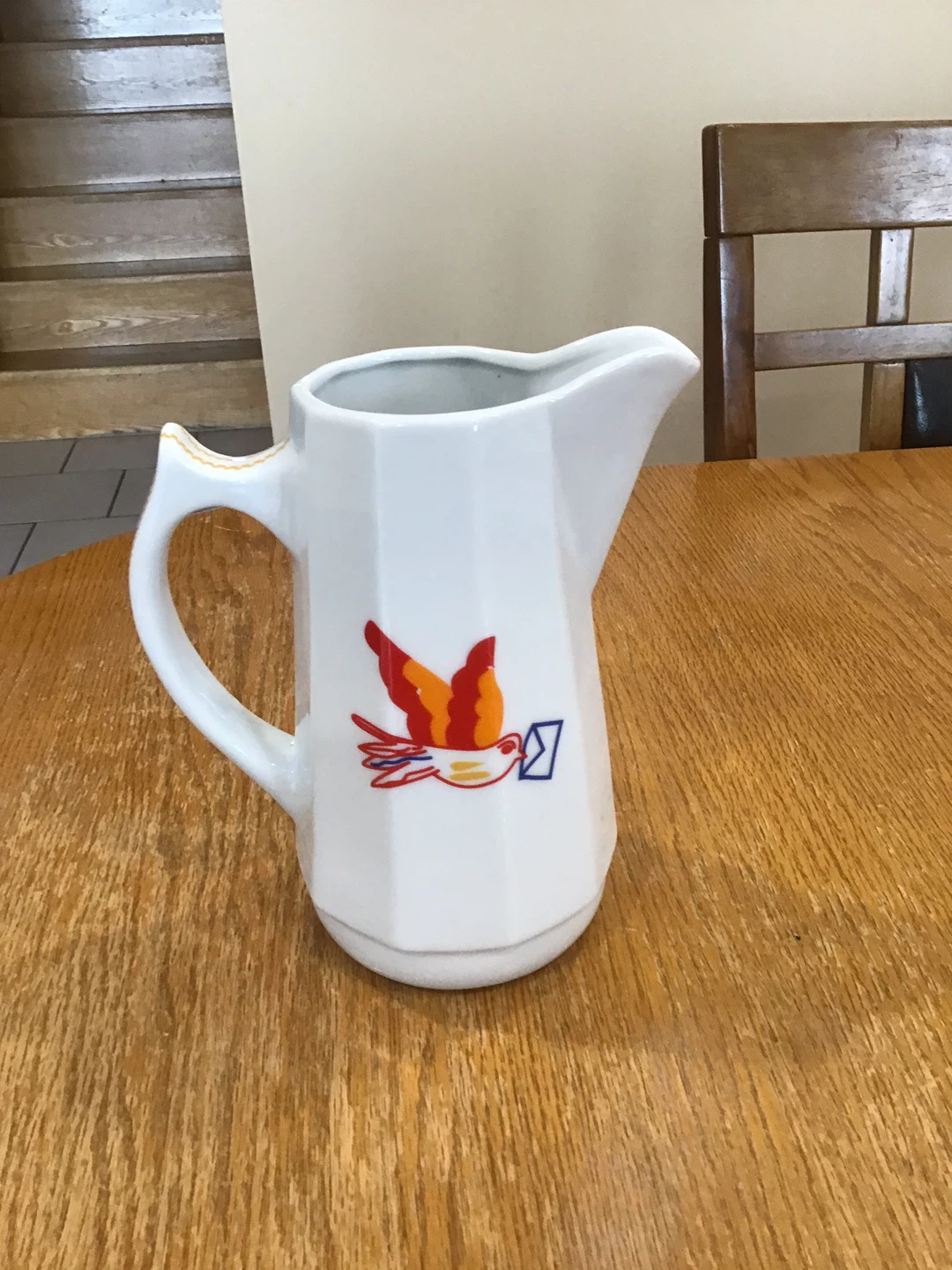 White Pitcher with Bird and Flower Design