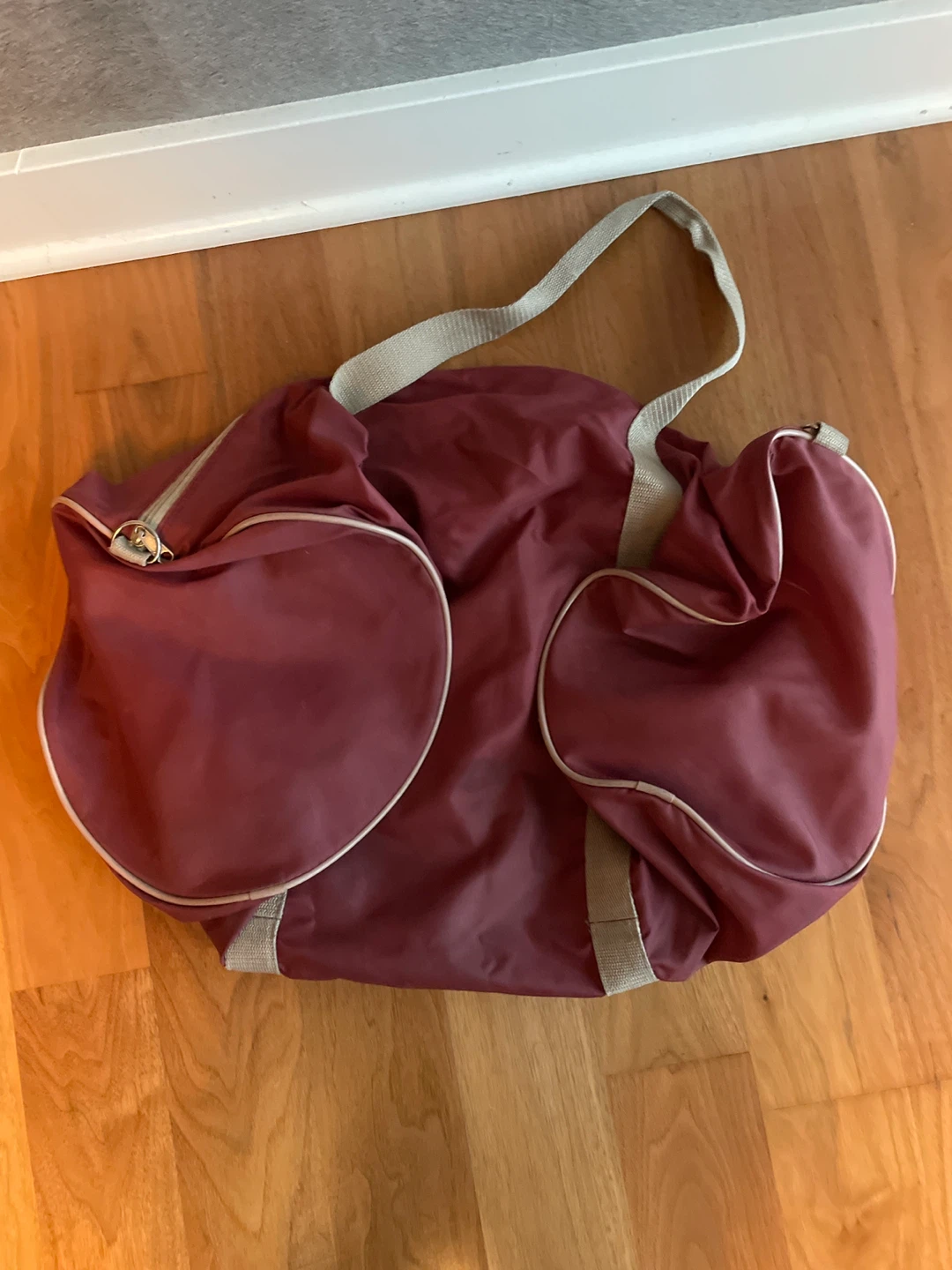 Maroon duffel bag