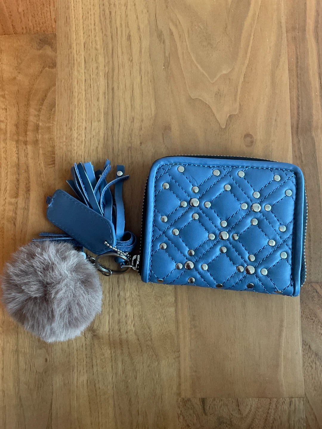 Blue Studded Zip Around Wallet with Pom Pom Charm