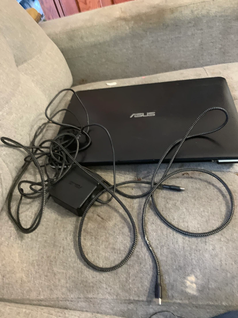 ASUS Laptop with Power Adapter call 672-975-5756