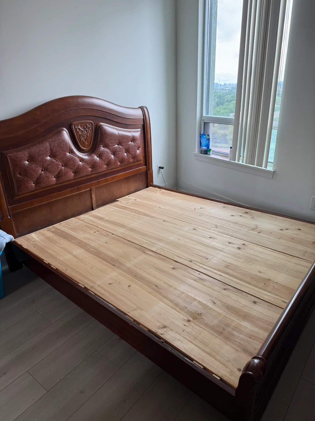 Queen wooden bed frame with upholstered headboard