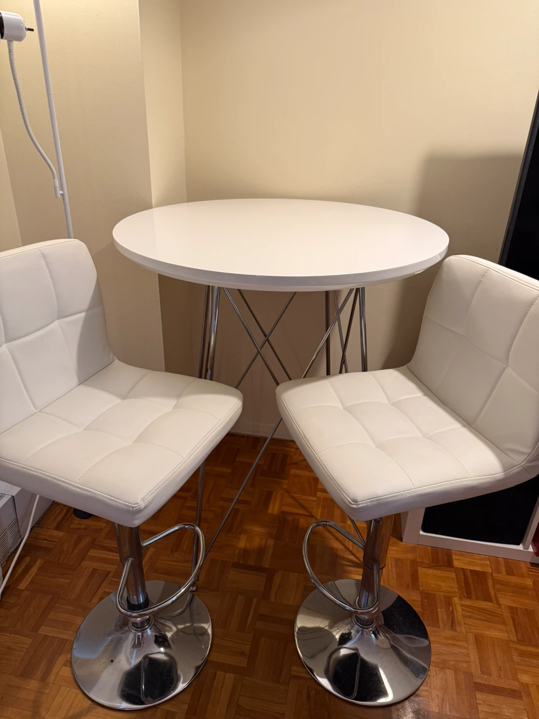 White Round Dining Table with 2 White Bar Stools