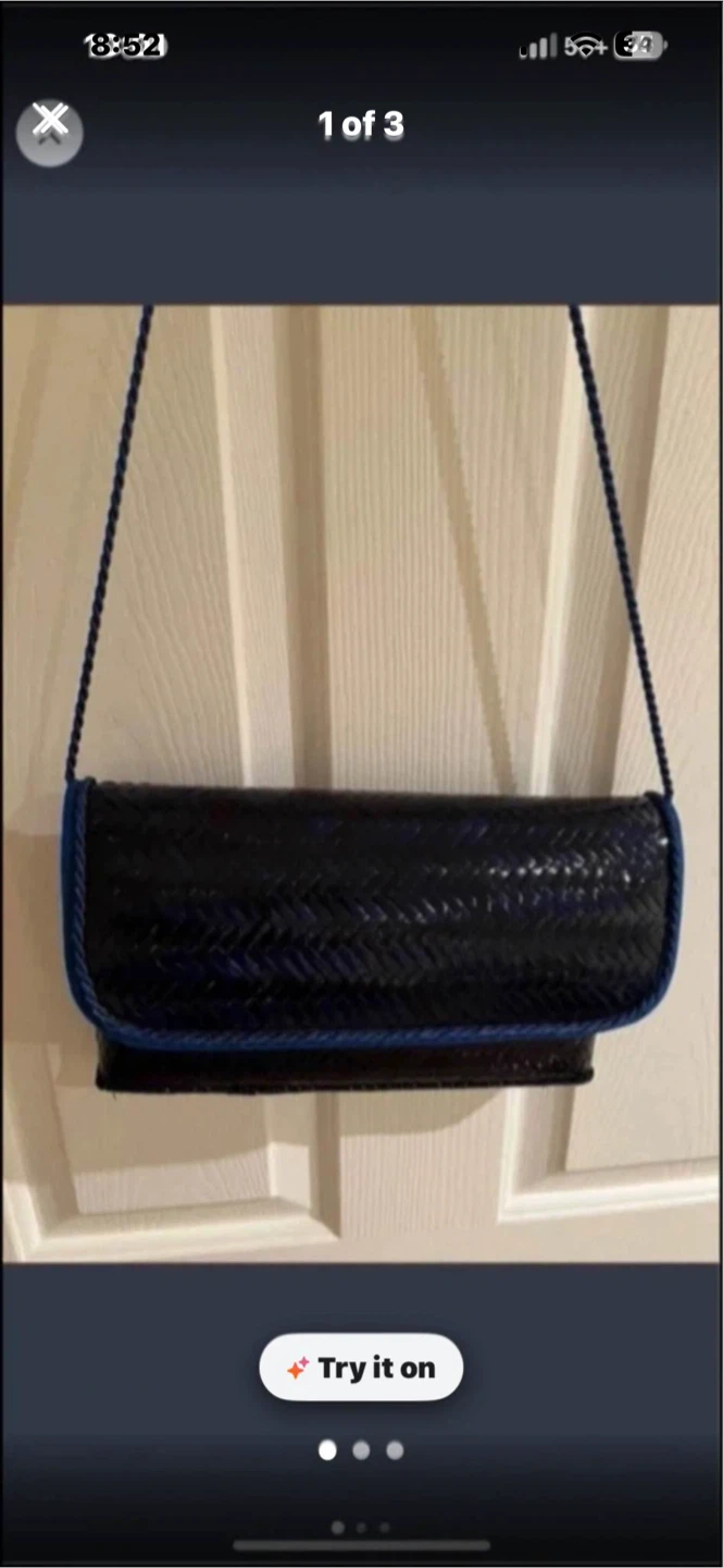 Blue woven clutch purse with blue trim