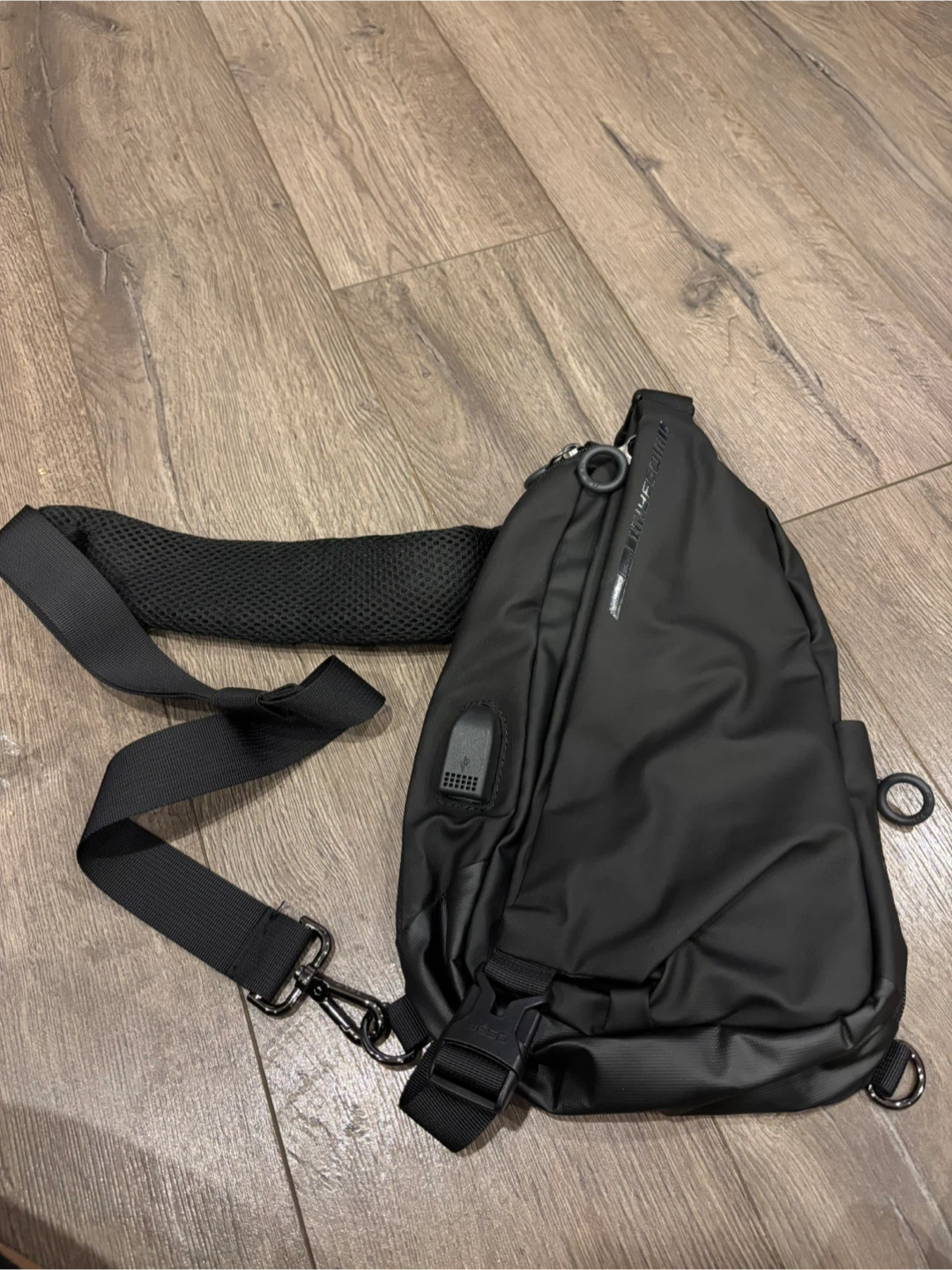 Black MESO Sling Bag with USB Port