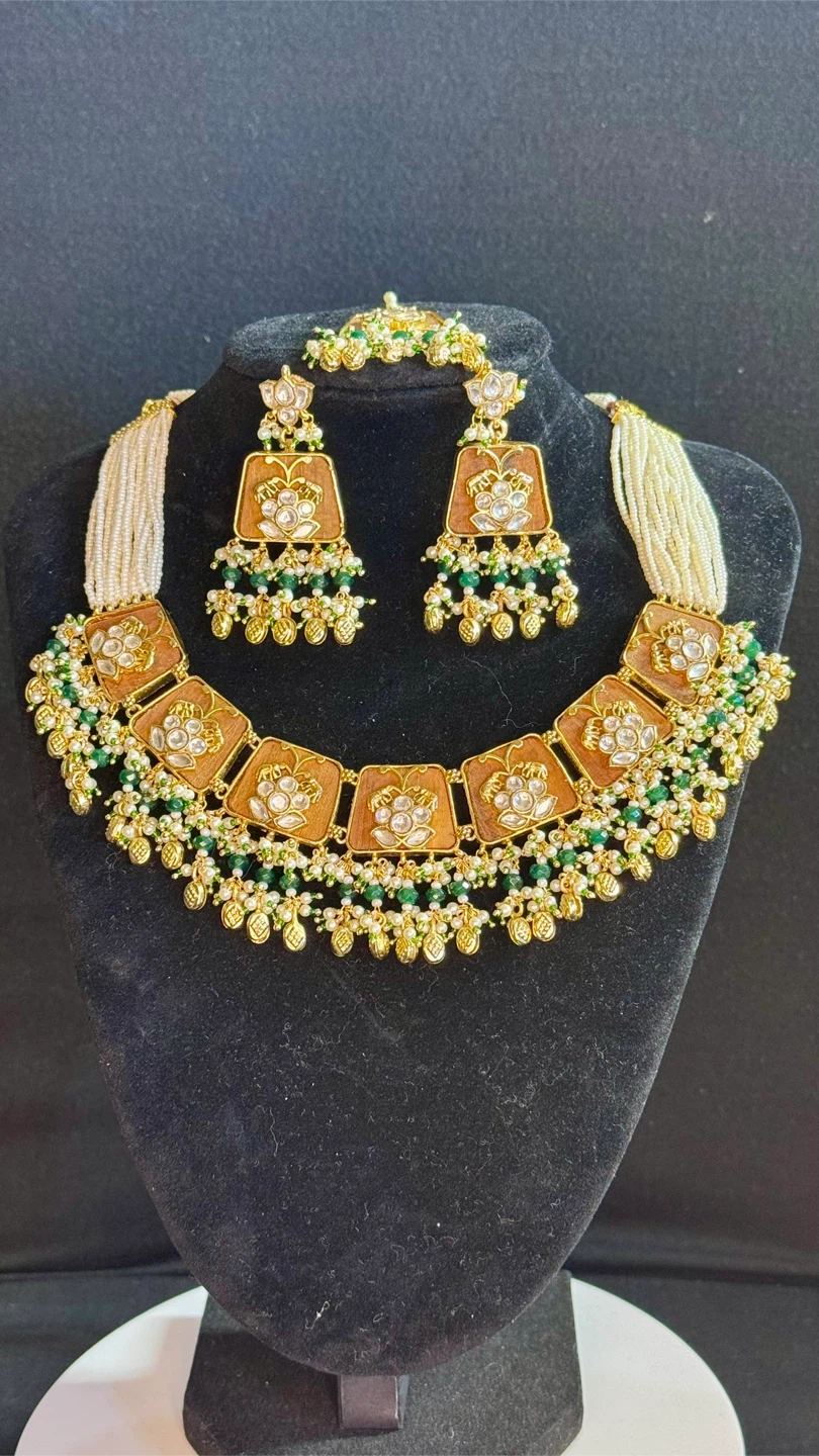 Brown with green pachi kundan set with tikka