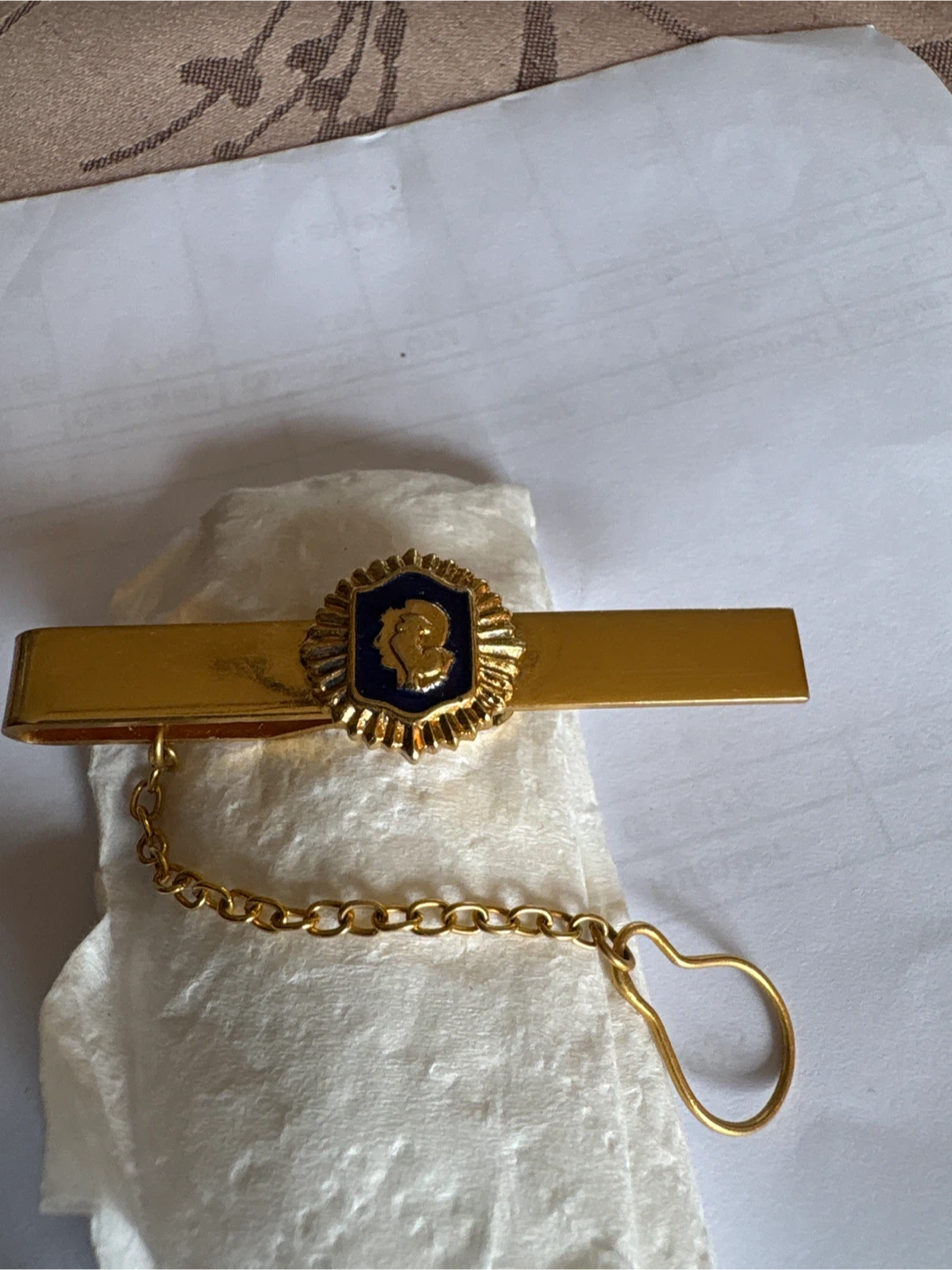 Gold Tie Clip with Blue Emblem and Chain