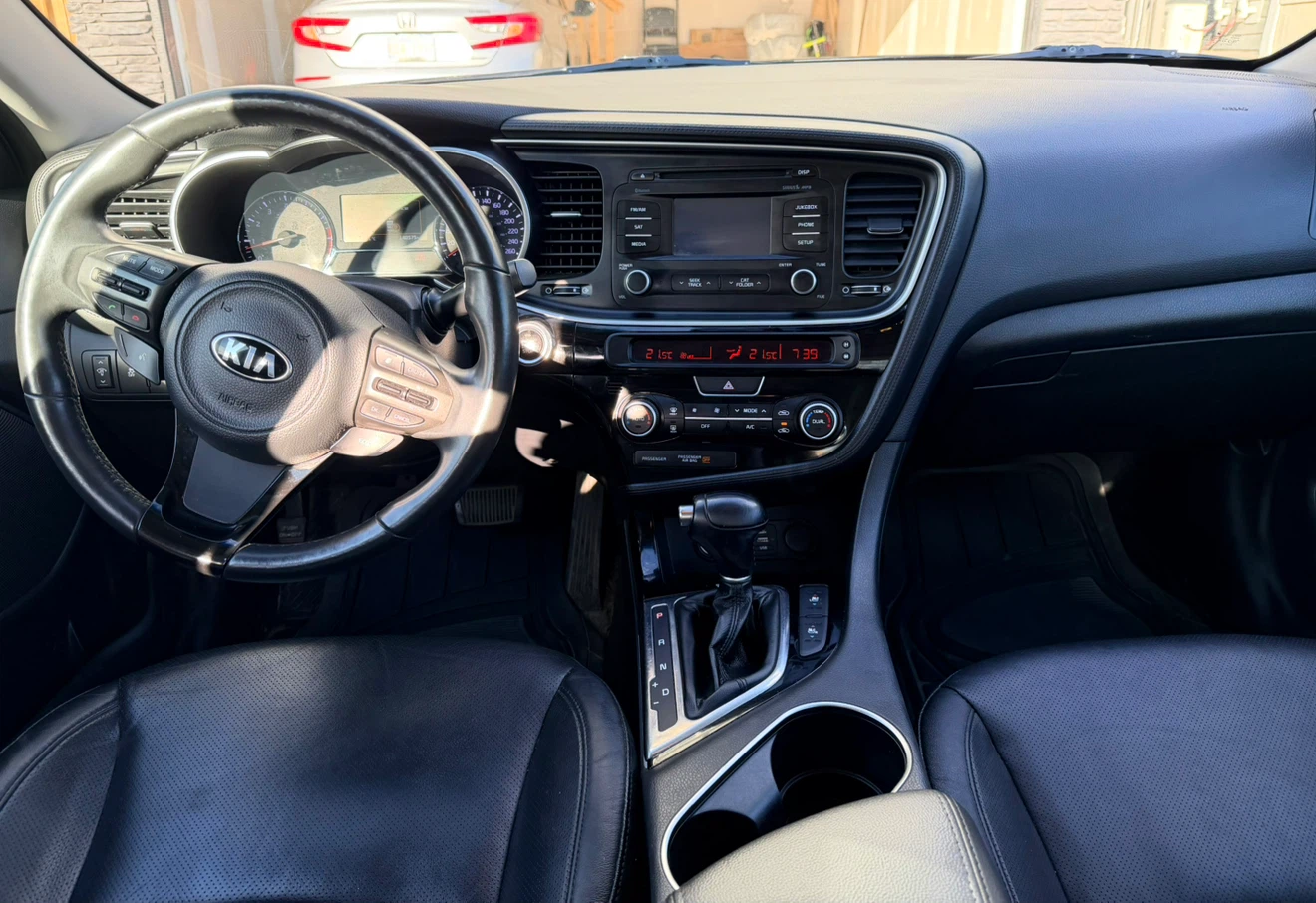 Kia Optima - photo 4