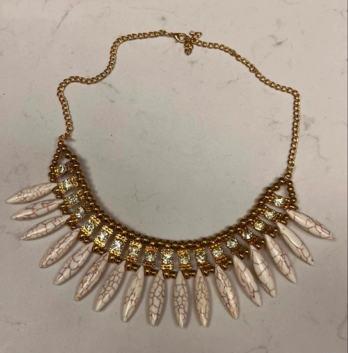 Gold-tone necklace with teardrop pendants