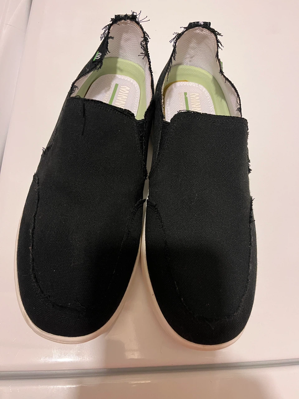 Minnetonka Black Slip-On Canvas Shoes - photo 2