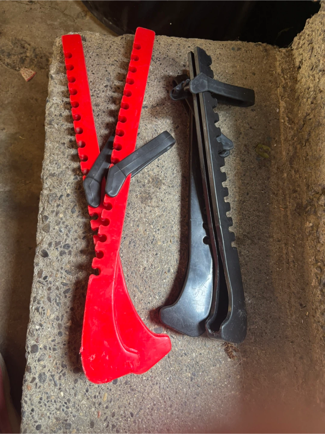 Red and Black Plastic Ice Skate Guards