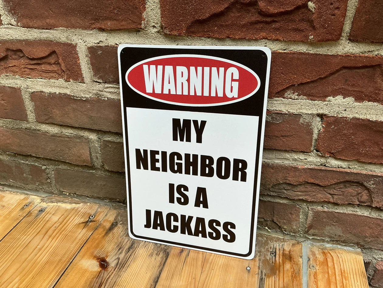 “WARNING MY NEIGHBOR IS A JACKASS” Tin  Sign