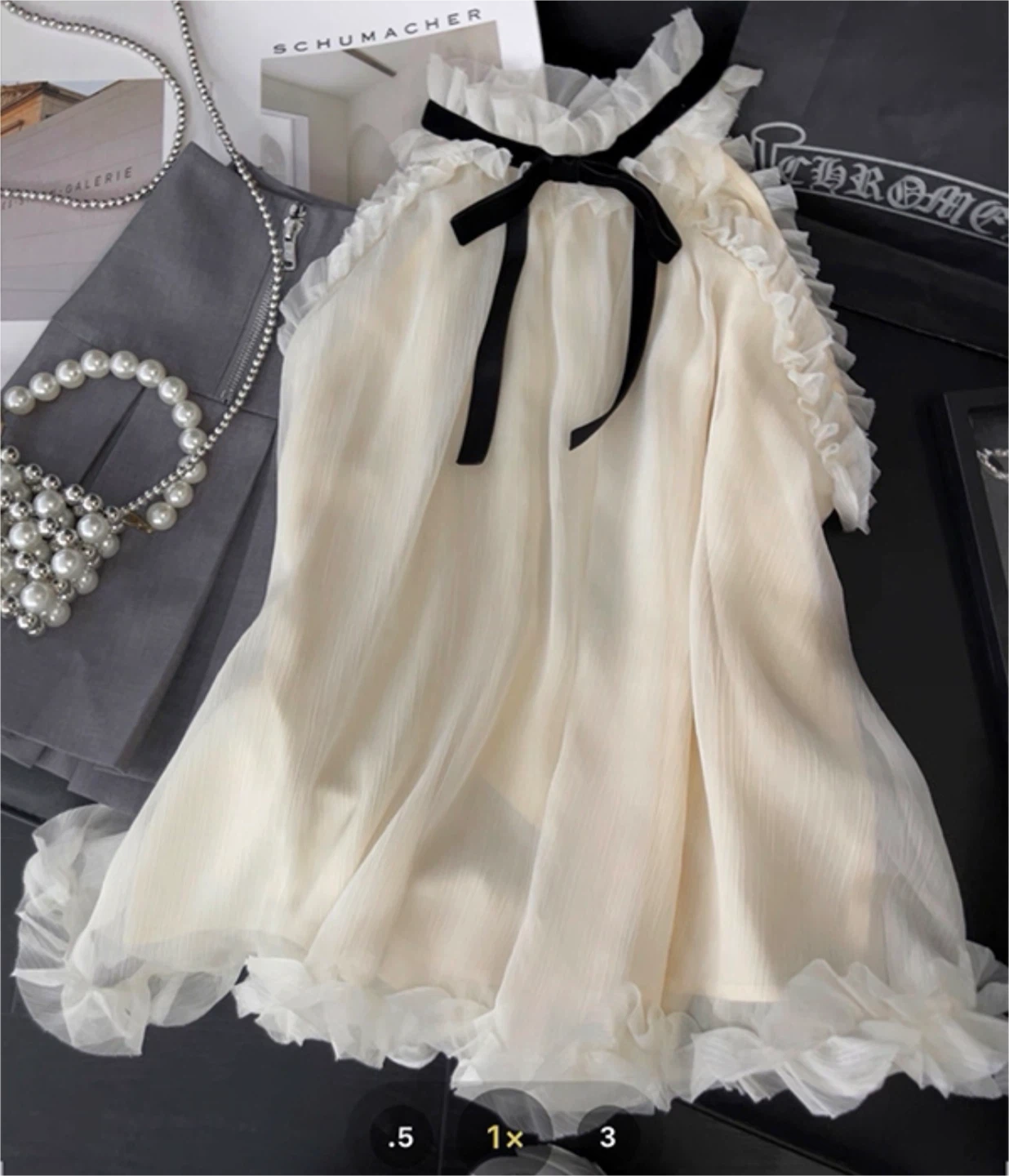 Cream Ruffle Halter top with Black Bow