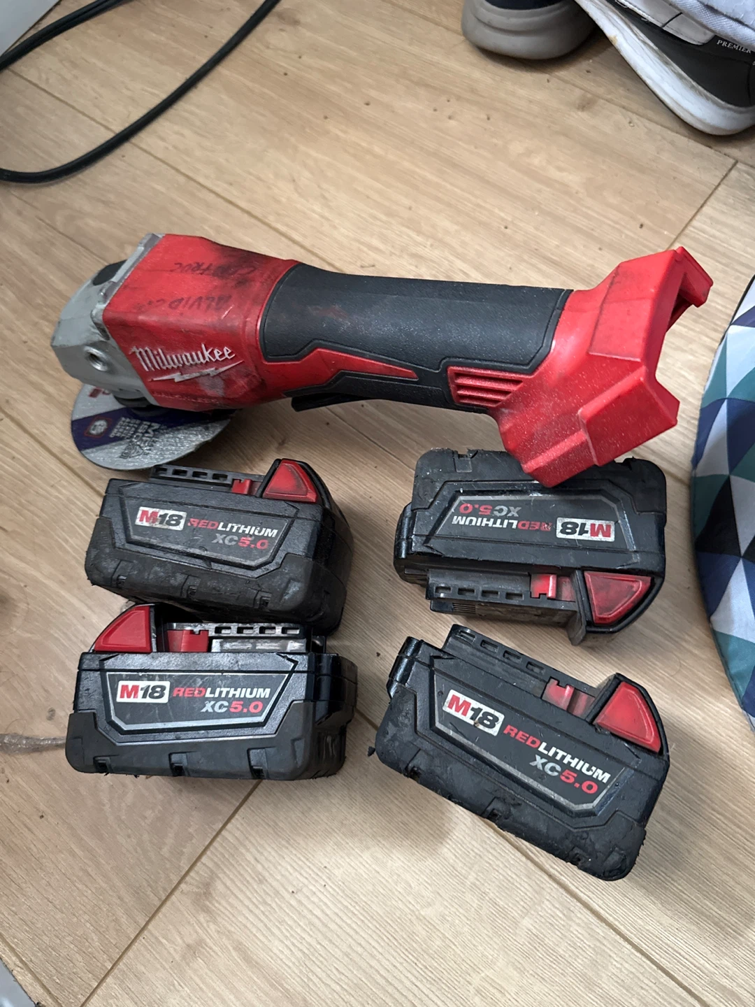 Milwaukee M18 Cordless Angle Grinder with 4 x 5.0Ah Batteries