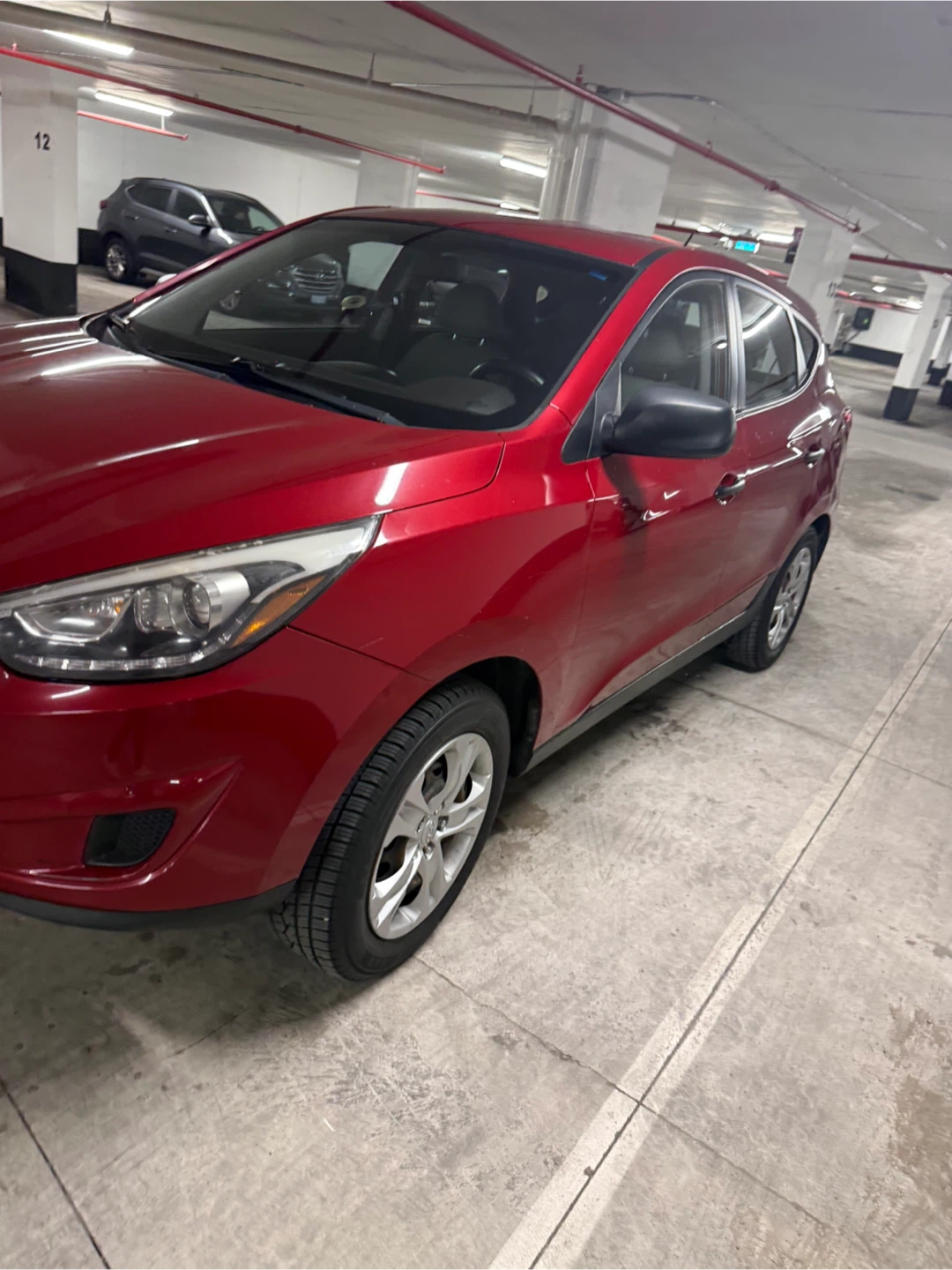 Red Hyundai Tucson SUV