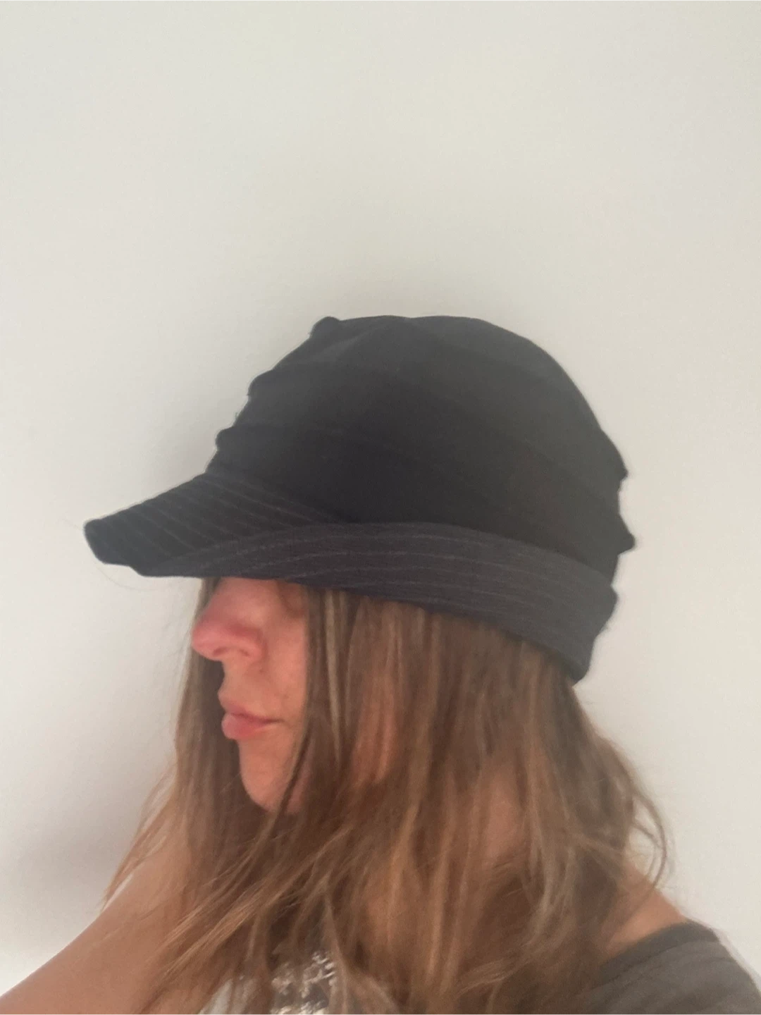 Black newsboy cap