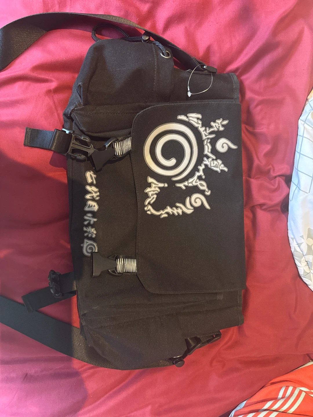 Black Messenger Bag with Unique Design